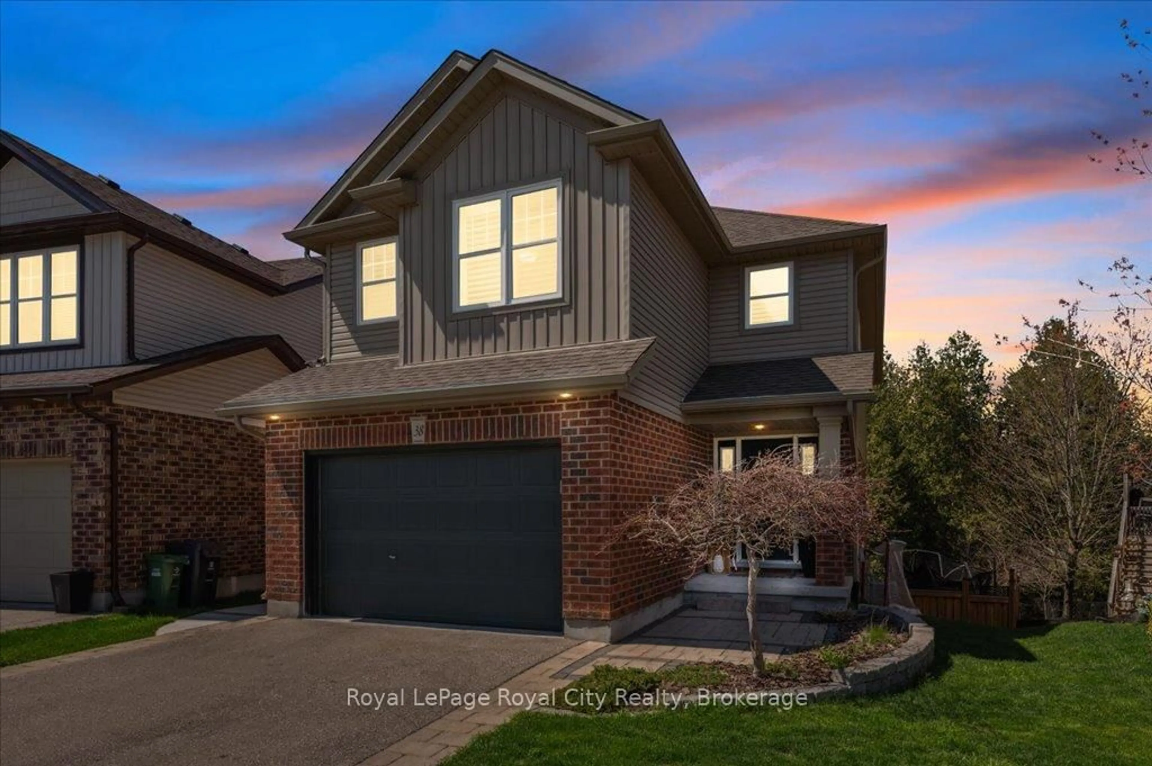 Home with brick exterior material, street for 38 Marshall Dr, Guelph Ontario N1E 0K7