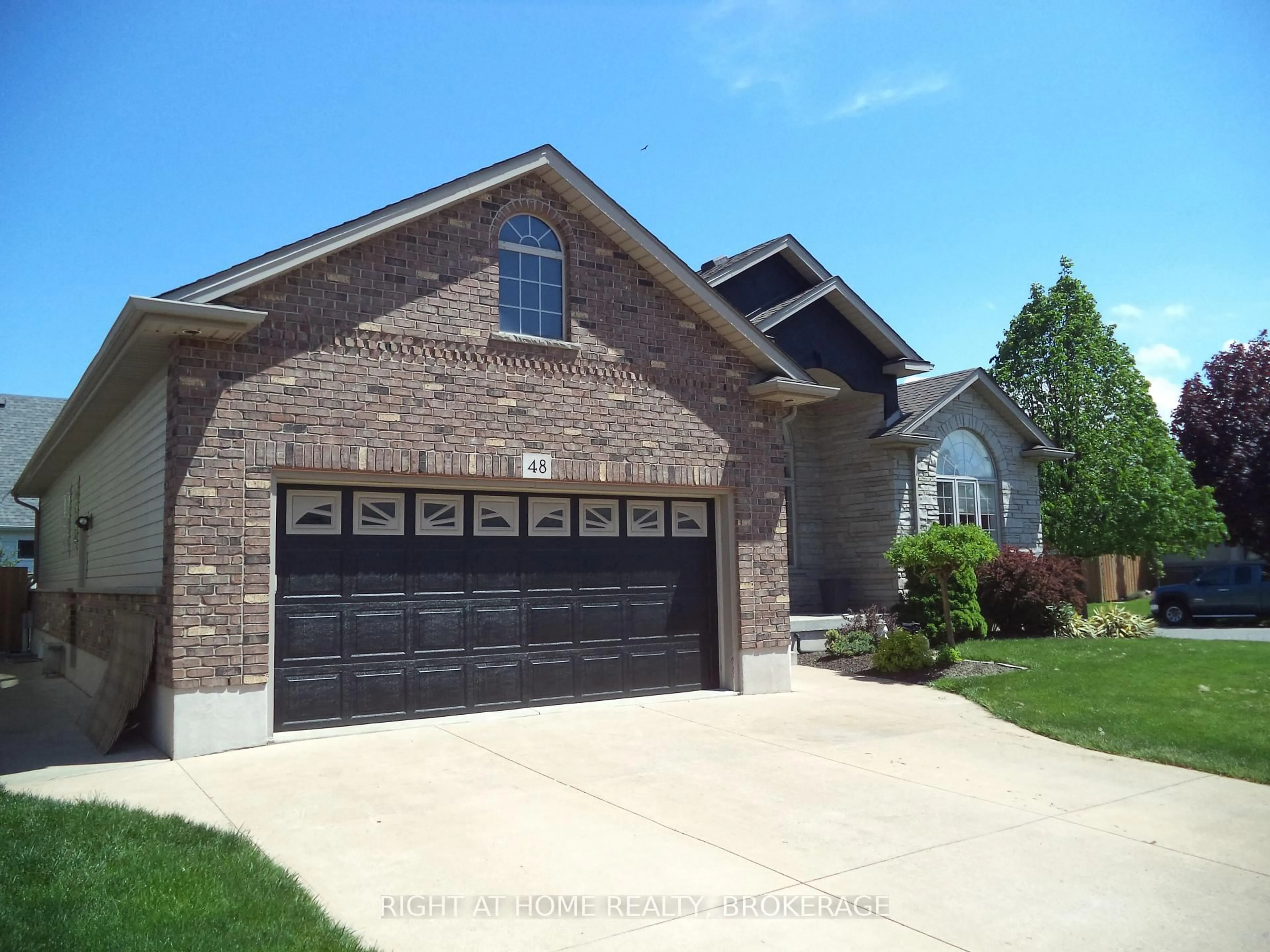 Home with brick exterior material, street for 48 Nicholas Dr, St. Catharines Ontario L2C 4C5