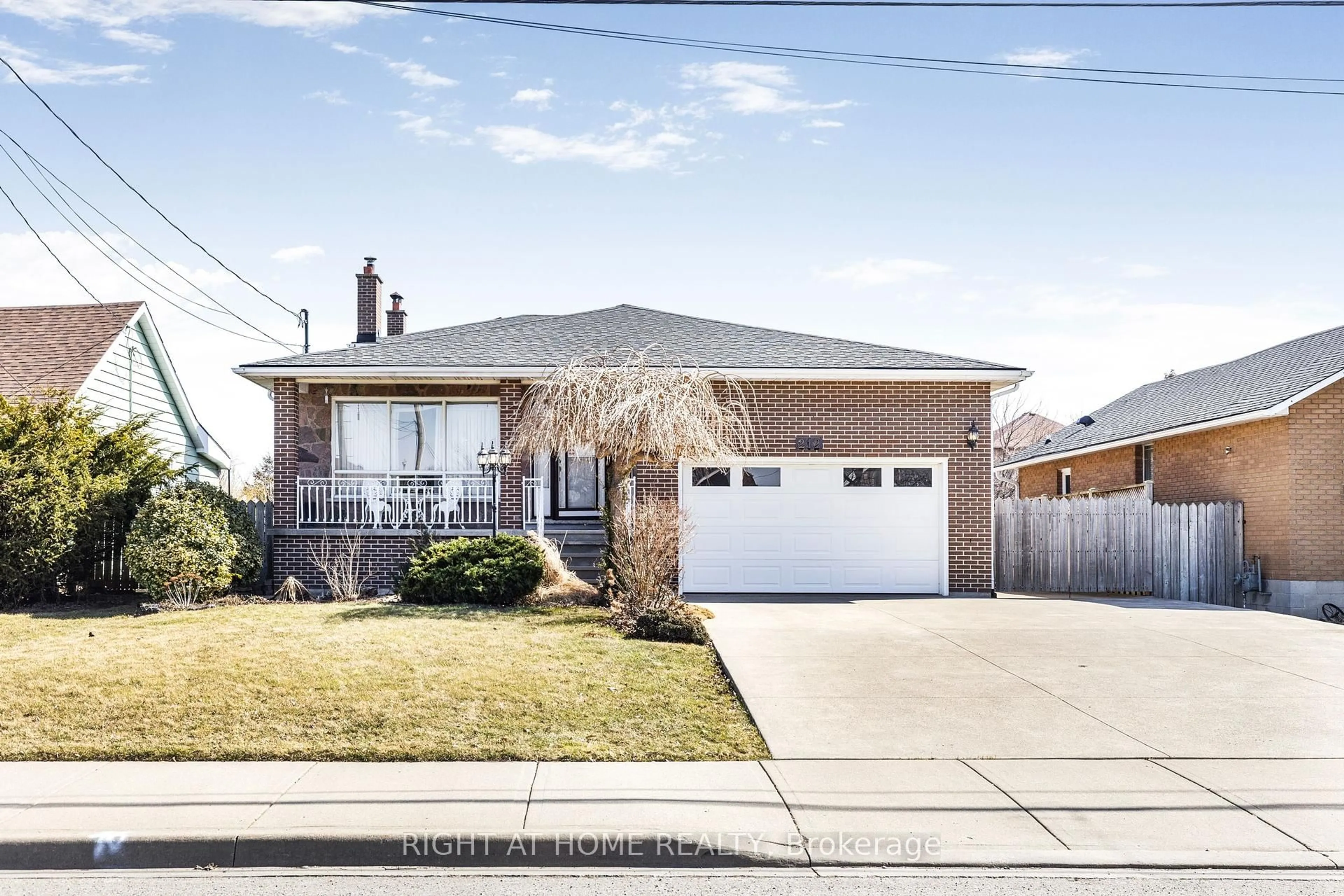 Home with brick exterior material, street for 212 Margaret Ave, Hamilton Ontario L8E 2H8