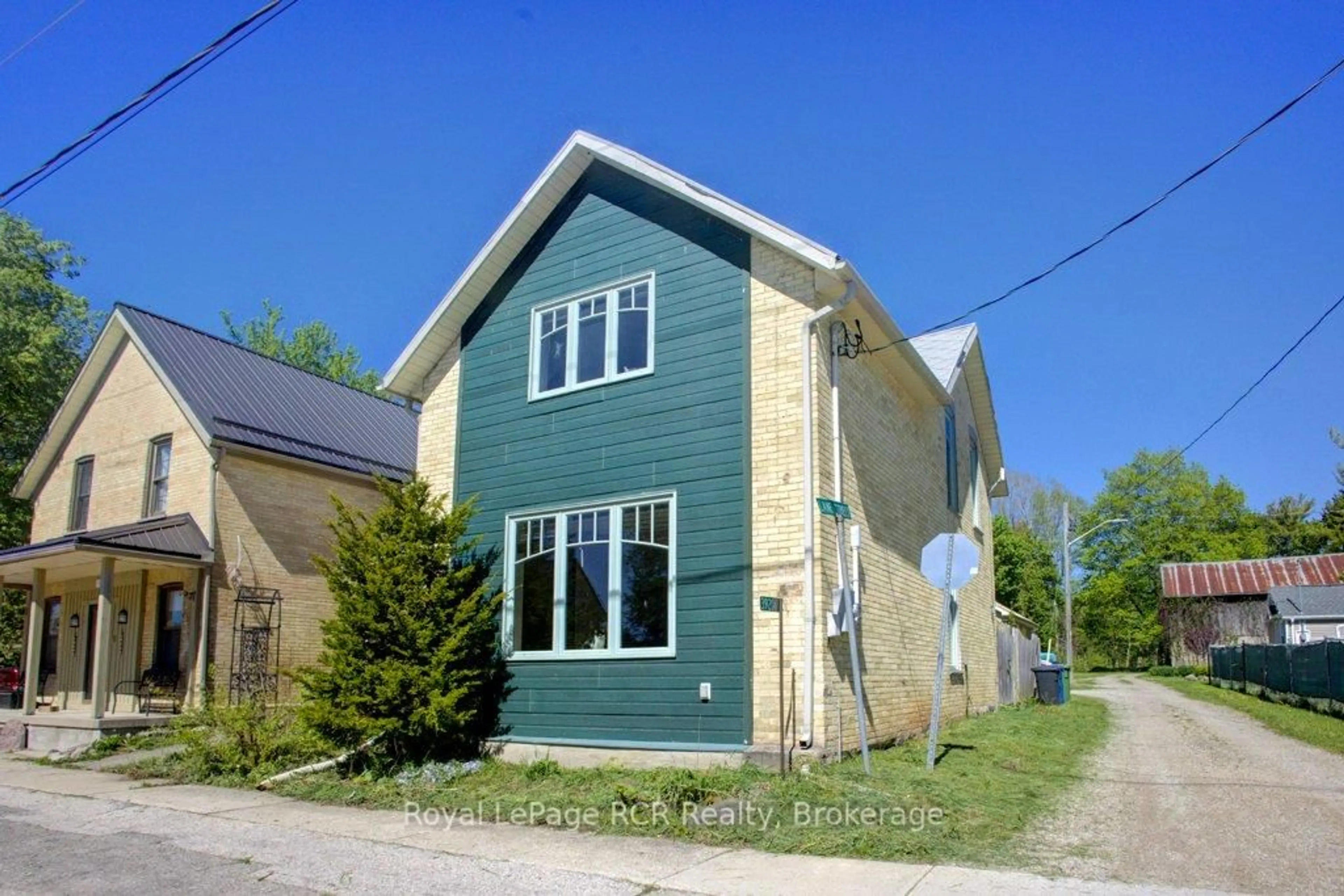 Home with vinyl exterior material, street for 392047 Grey Rd 109 Rd, Southgate Ontario N0G 2A0