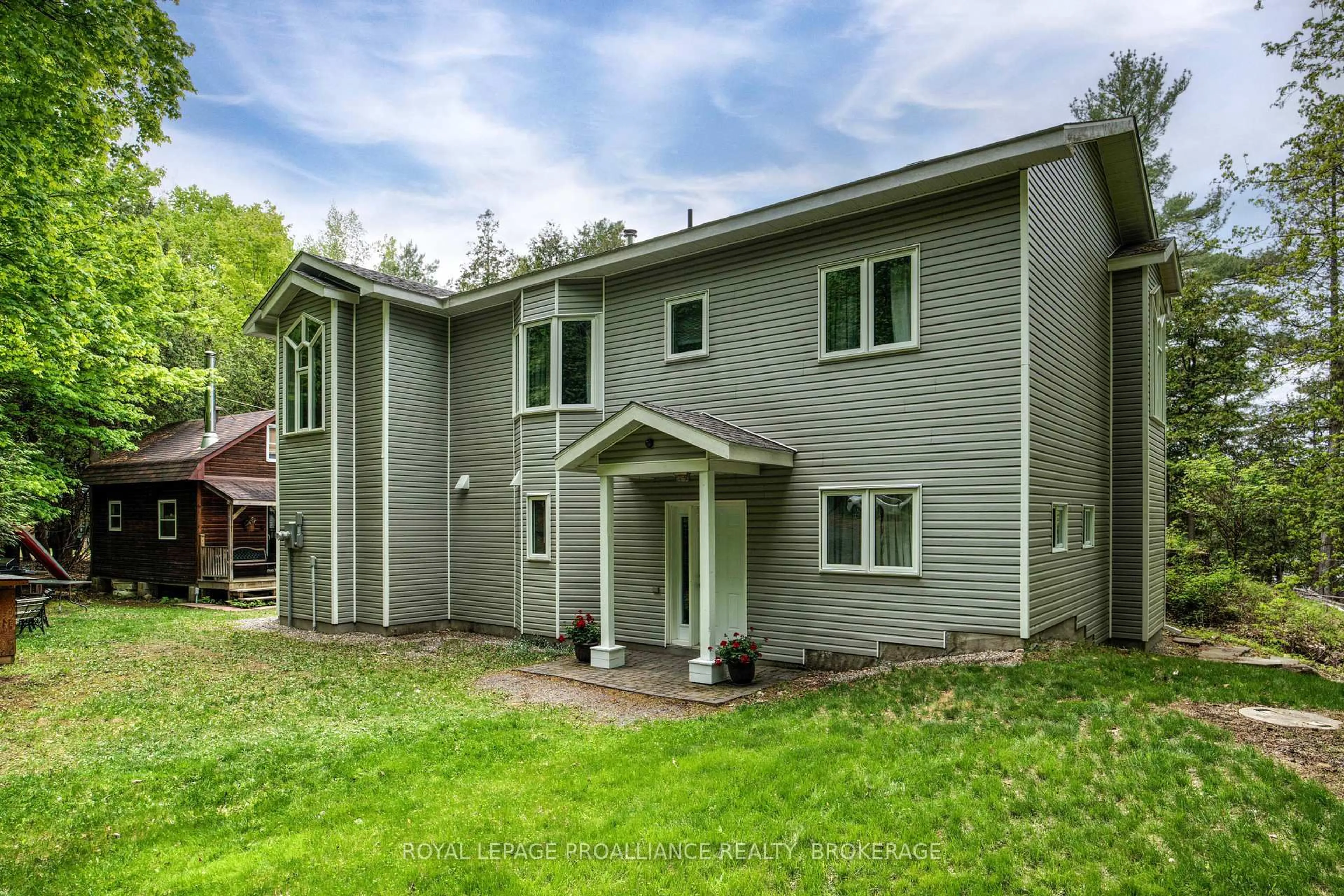 Home with vinyl exterior material, building for 32C Chadwick Lane, Sydenham Ontario K0H 2T0