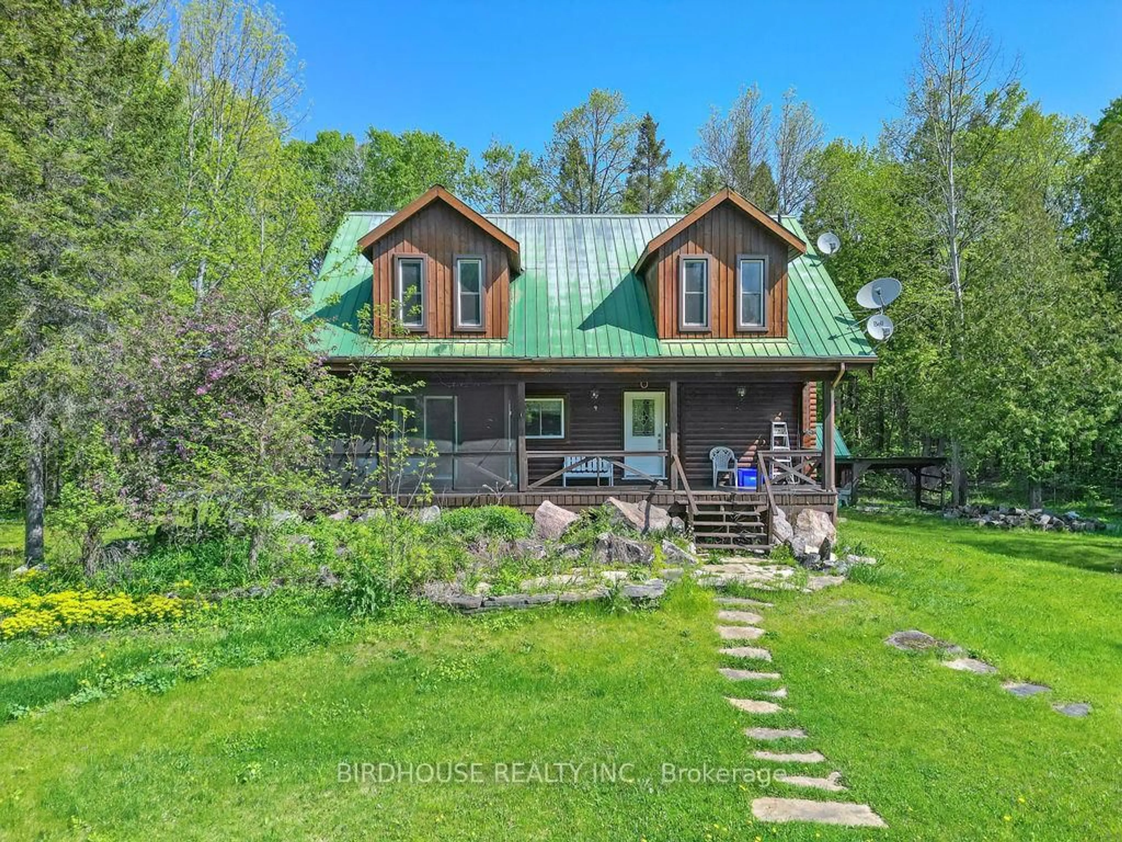 A pic from outside/outdoor area/front of a property/back of a property/a pic from drone, unknown for 189 Dartmoor Rd, Kawartha Lakes Ontario L0K 1W0