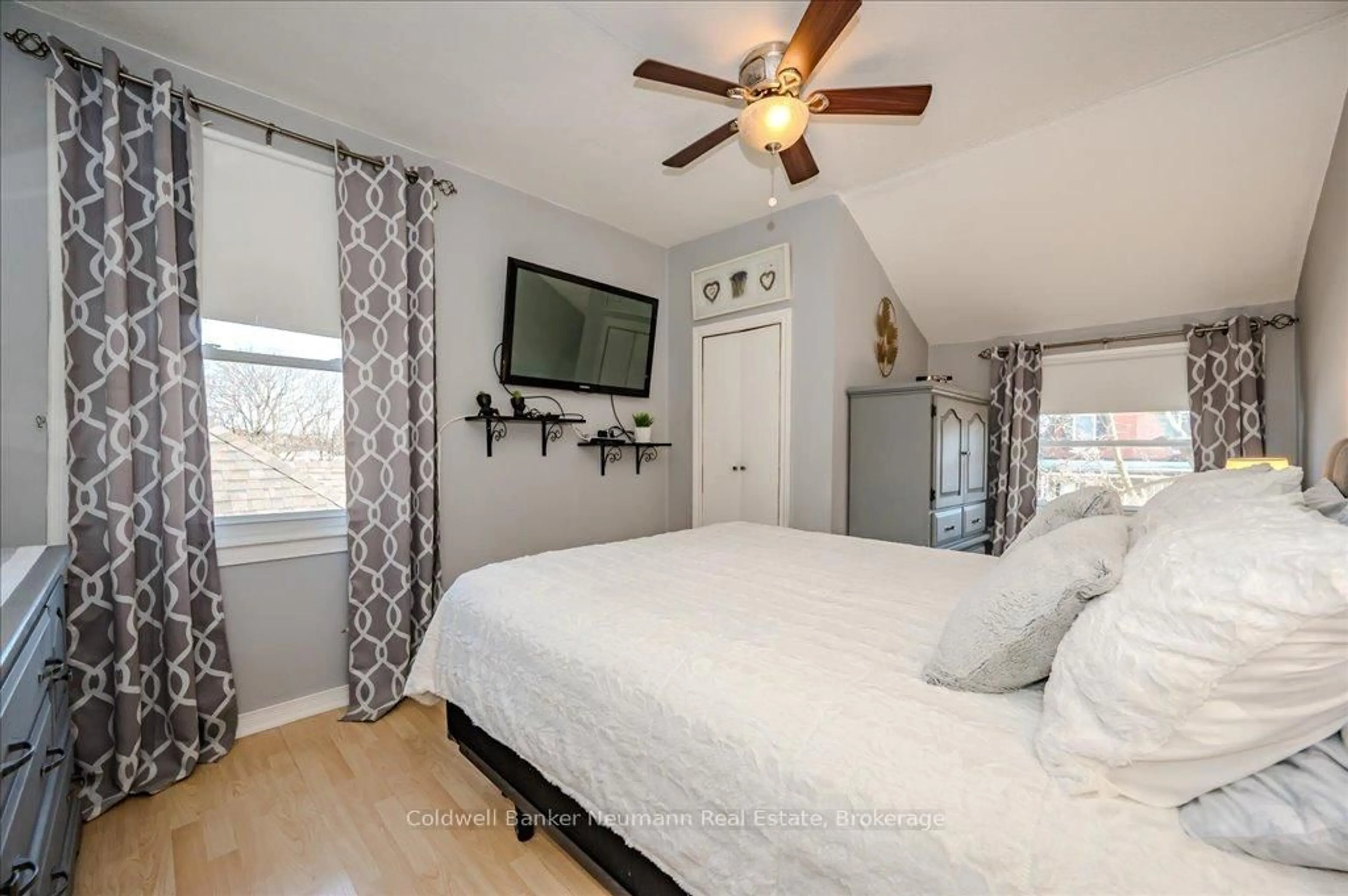 Bedroom with bed, wood/laminate floor for 22 Simcoe St, Guelph Ontario N1E 3B8