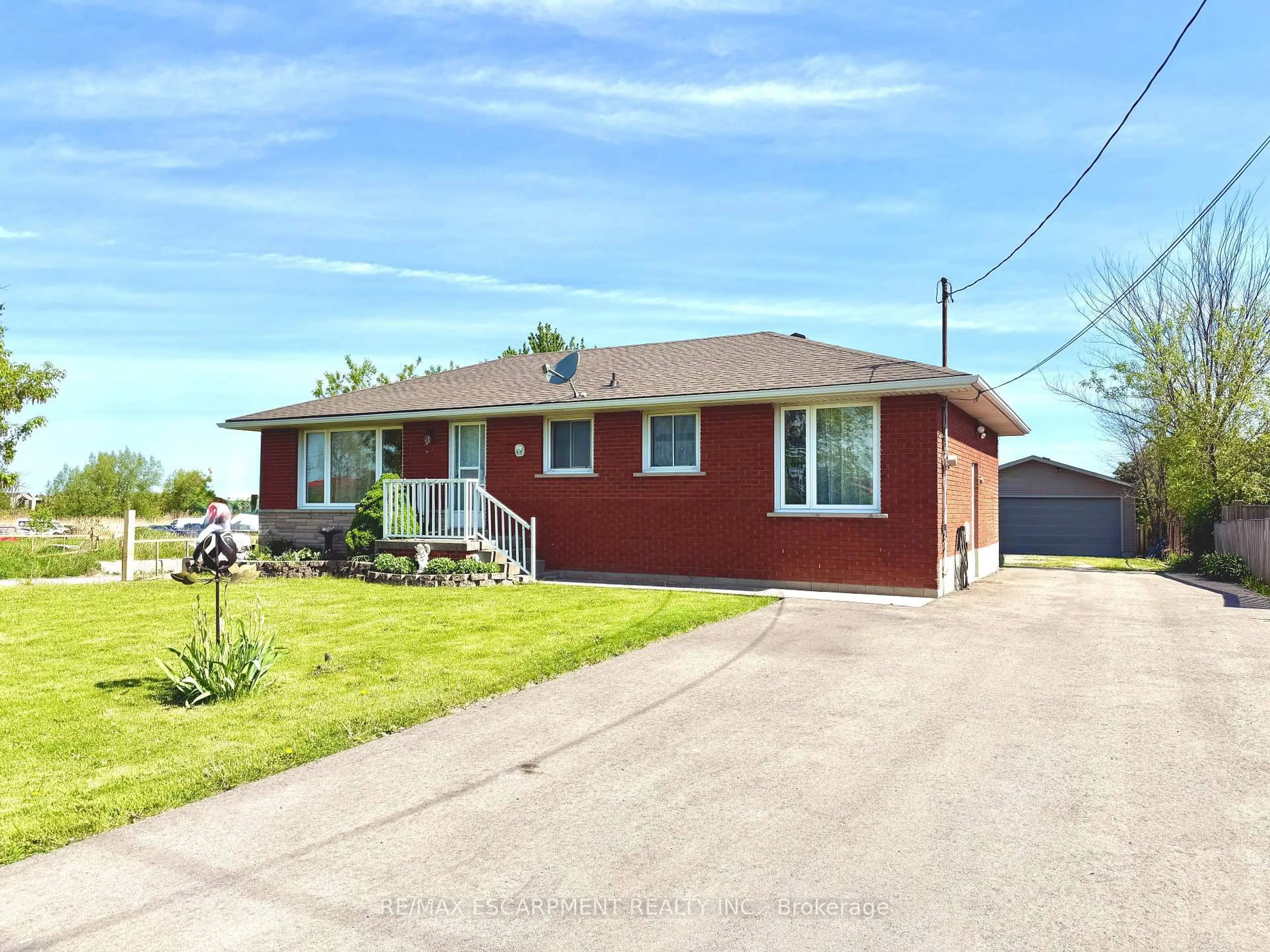 Home with brick exterior material, street for 725 Mud St, Hamilton Ontario L8J 3B8