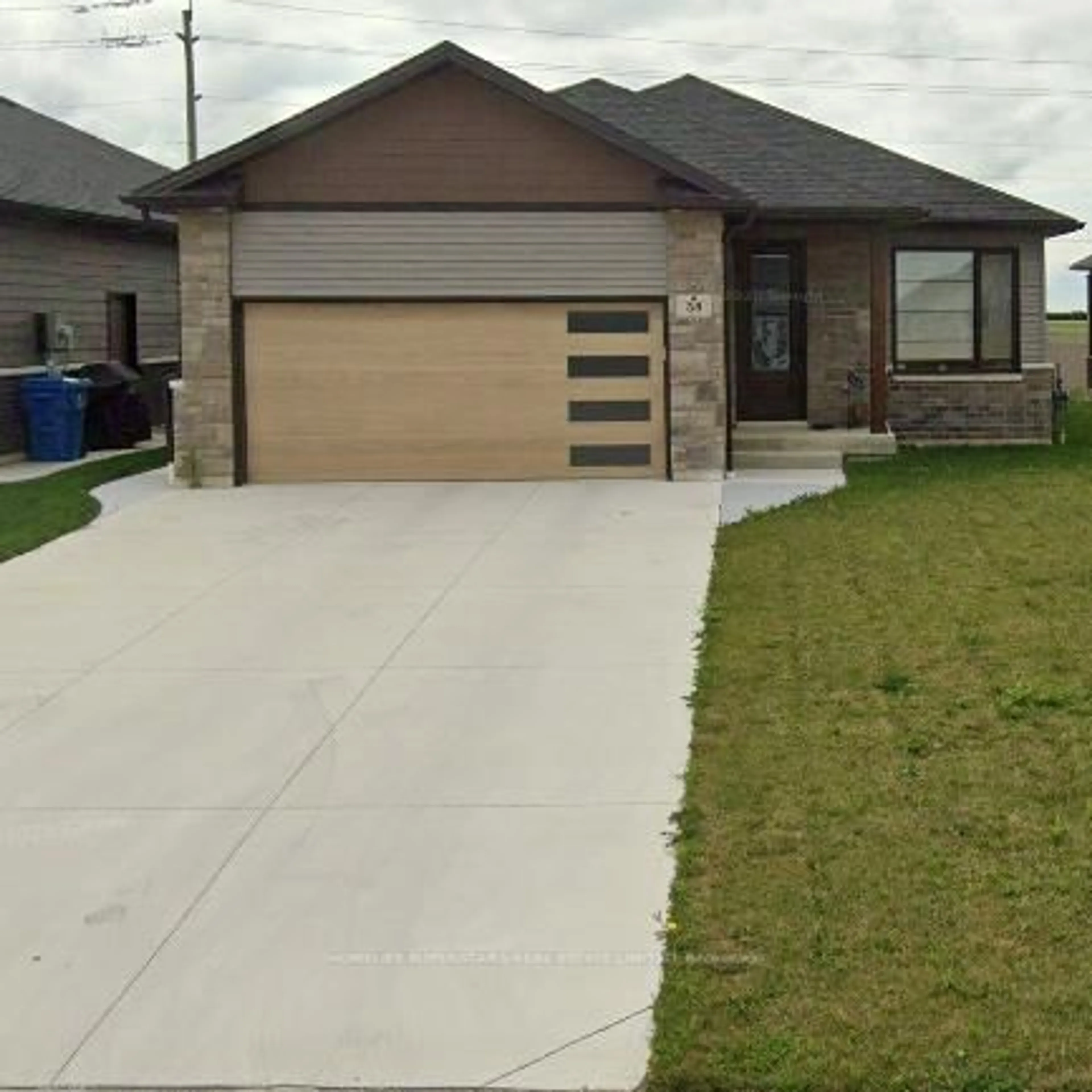 Home with brick exterior material, street for 38 Evening Dr, Chatham-Kent Ontario N7L 0B6