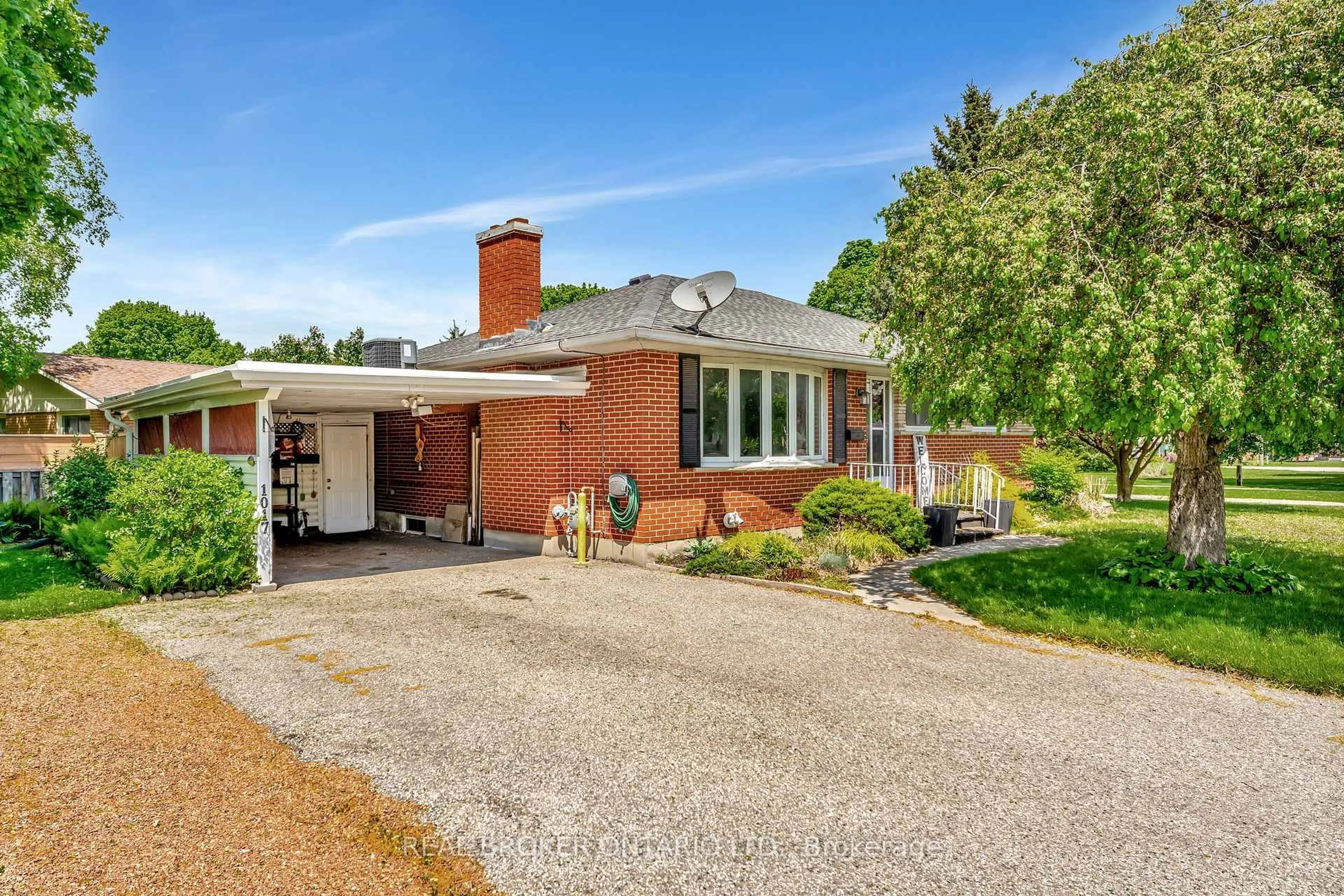 Home with brick exterior material, street for 1017 Braeside St, Woodstock Ontario N4S 4T3