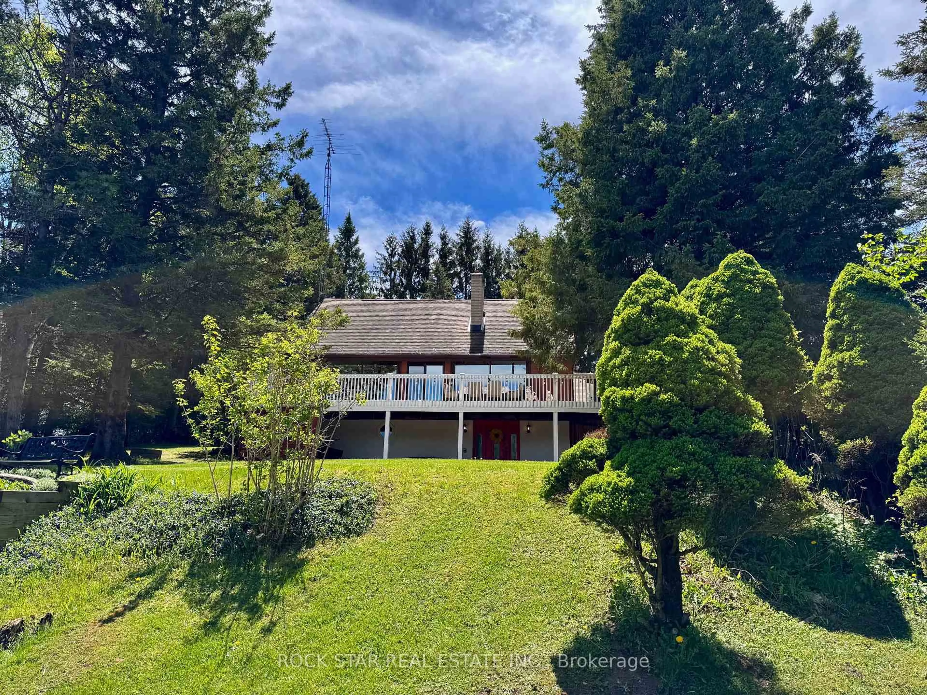 A pic from outside/outdoor area/front of a property/back of a property/a pic from drone, mountain view for 8 Pine River Cres, Mulmur Ontario L9V 3H2