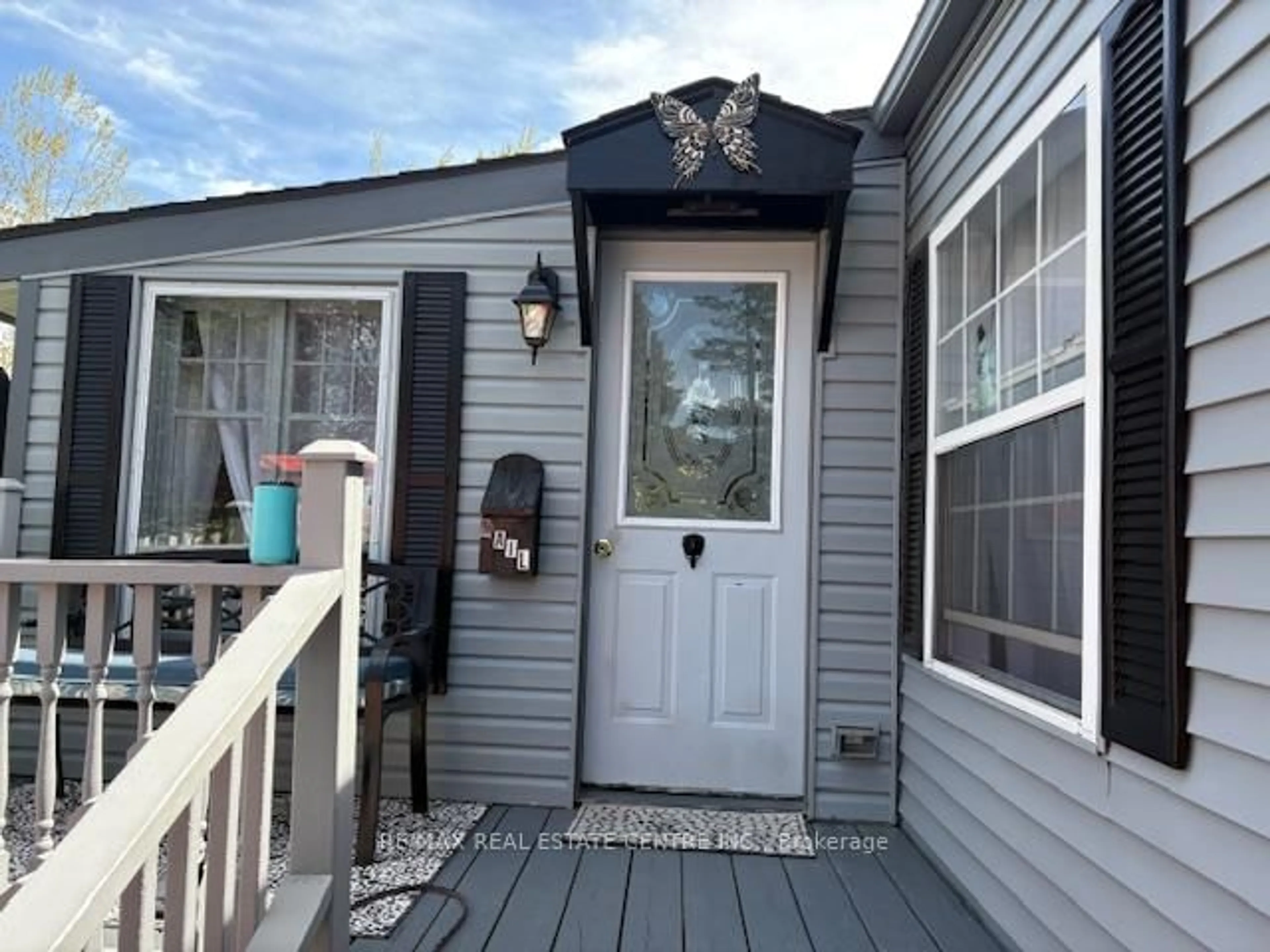 Home with vinyl exterior material, street for 64 Maple Grove Village Rd, Southgate Ontario N0C 1B0