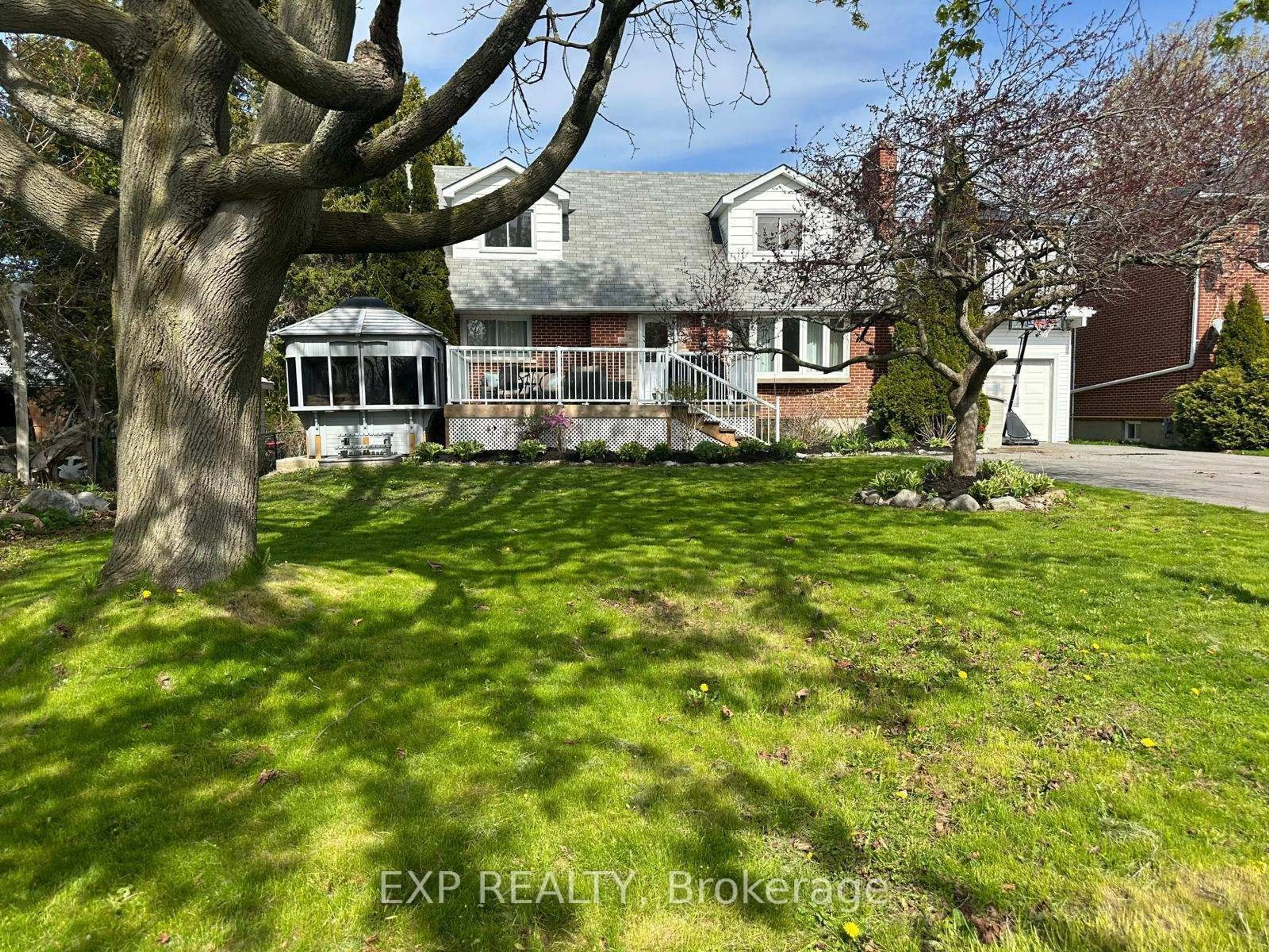 A pic from outside/outdoor area/front of a property/back of a property/a pic from drone, street for 130 Tremaine St, Cobourg Ontario K9A 2Z3