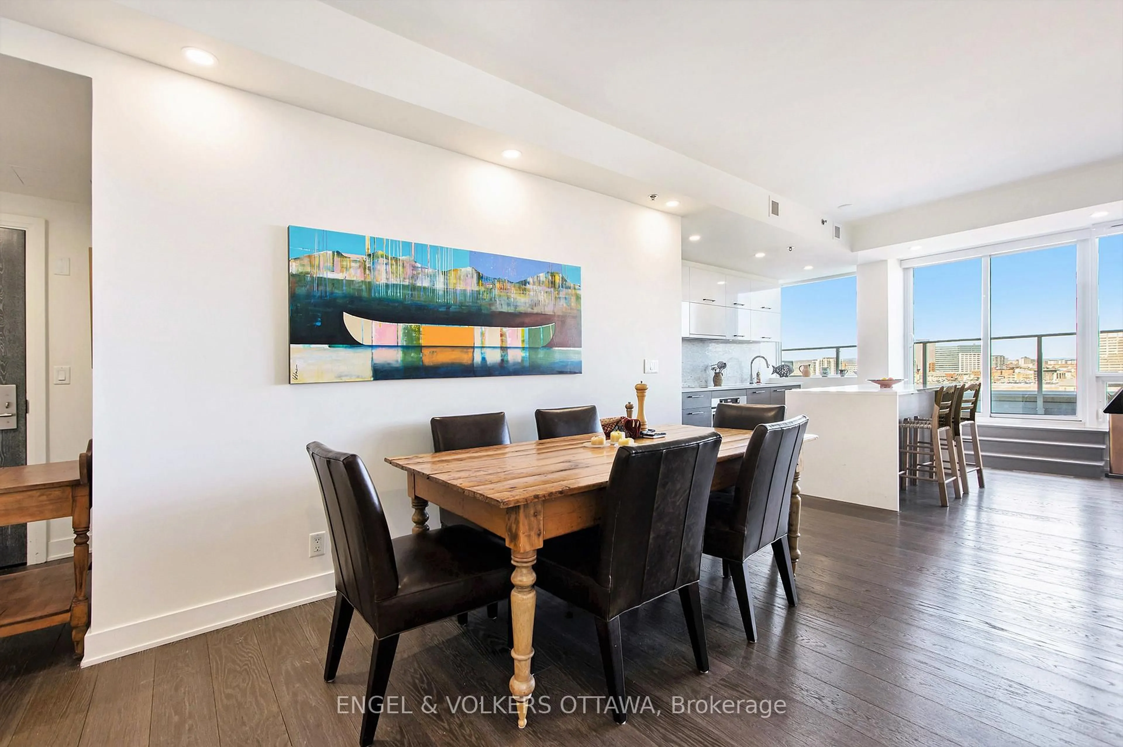 Open concept kitchen, wood/laminate floor for 428 Sparks St #305, Ottawa Ontario K1R 0B3