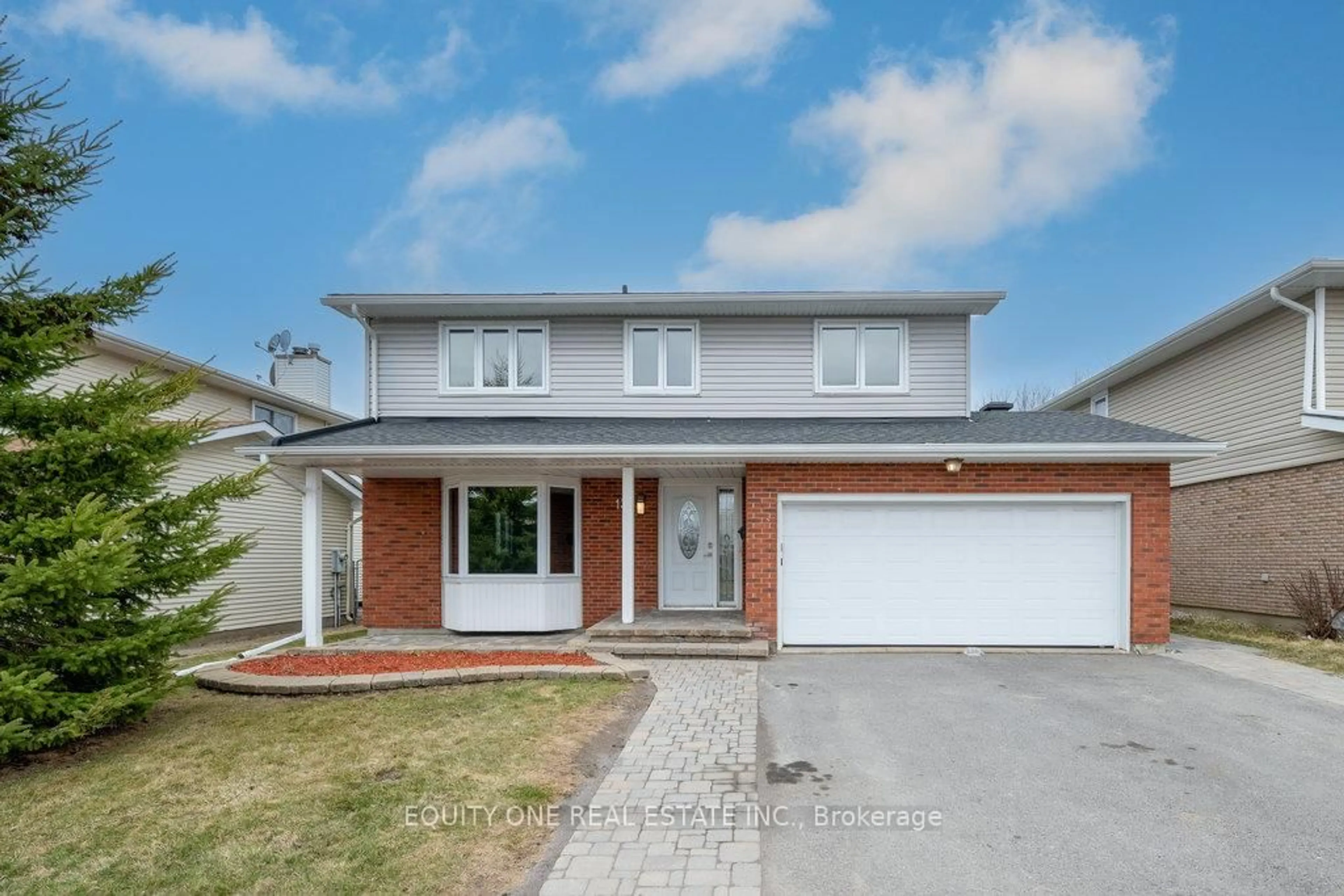 Home with brick exterior material, street for 135 Medhurst Dr, Ottawa Ontario K2G 4J9