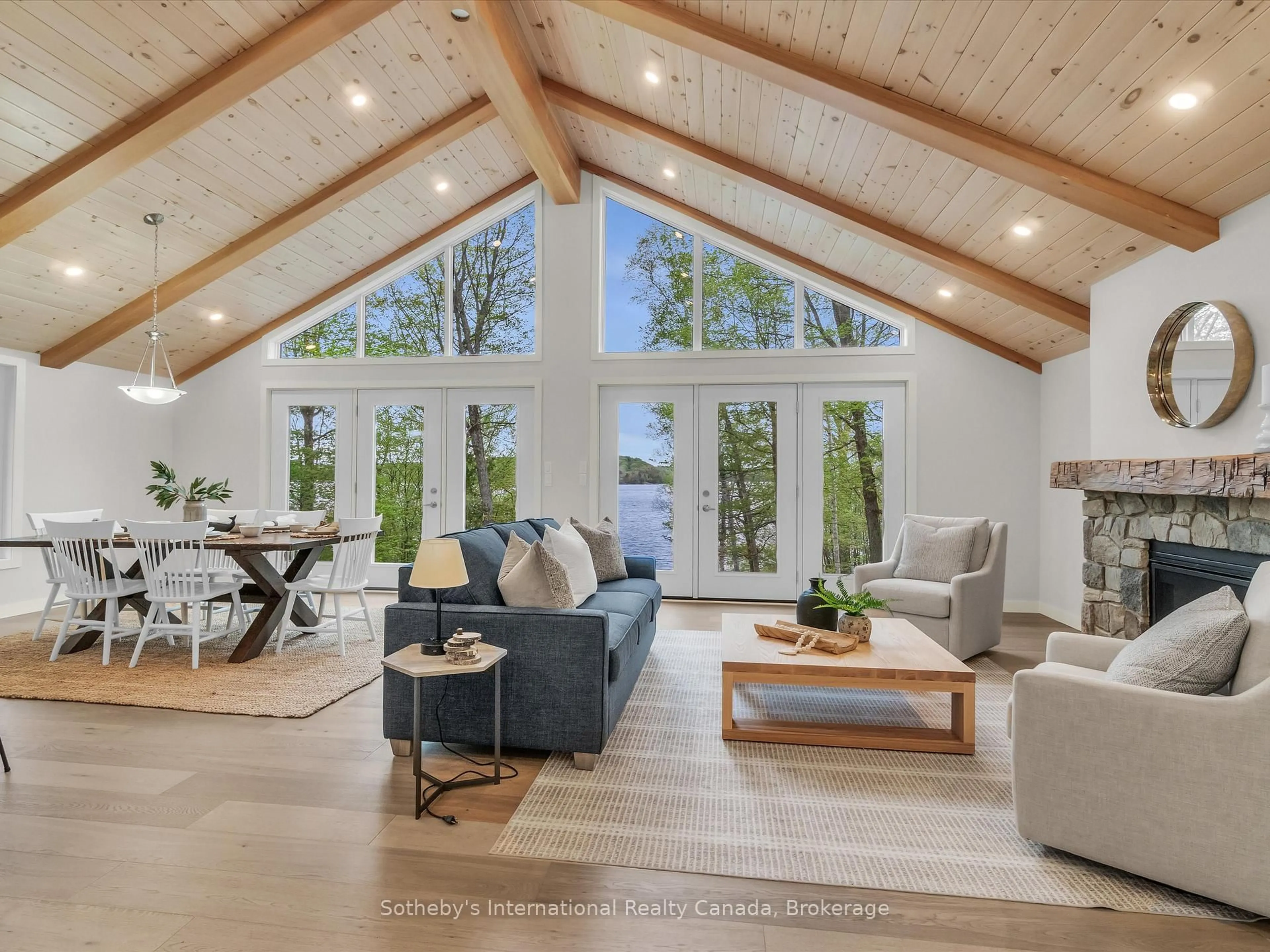 Living room with furniture, wood/laminate floor for 3179 Muskoka Road 117 N/A ##2, Lake of Bays Ontario P0B 1A0