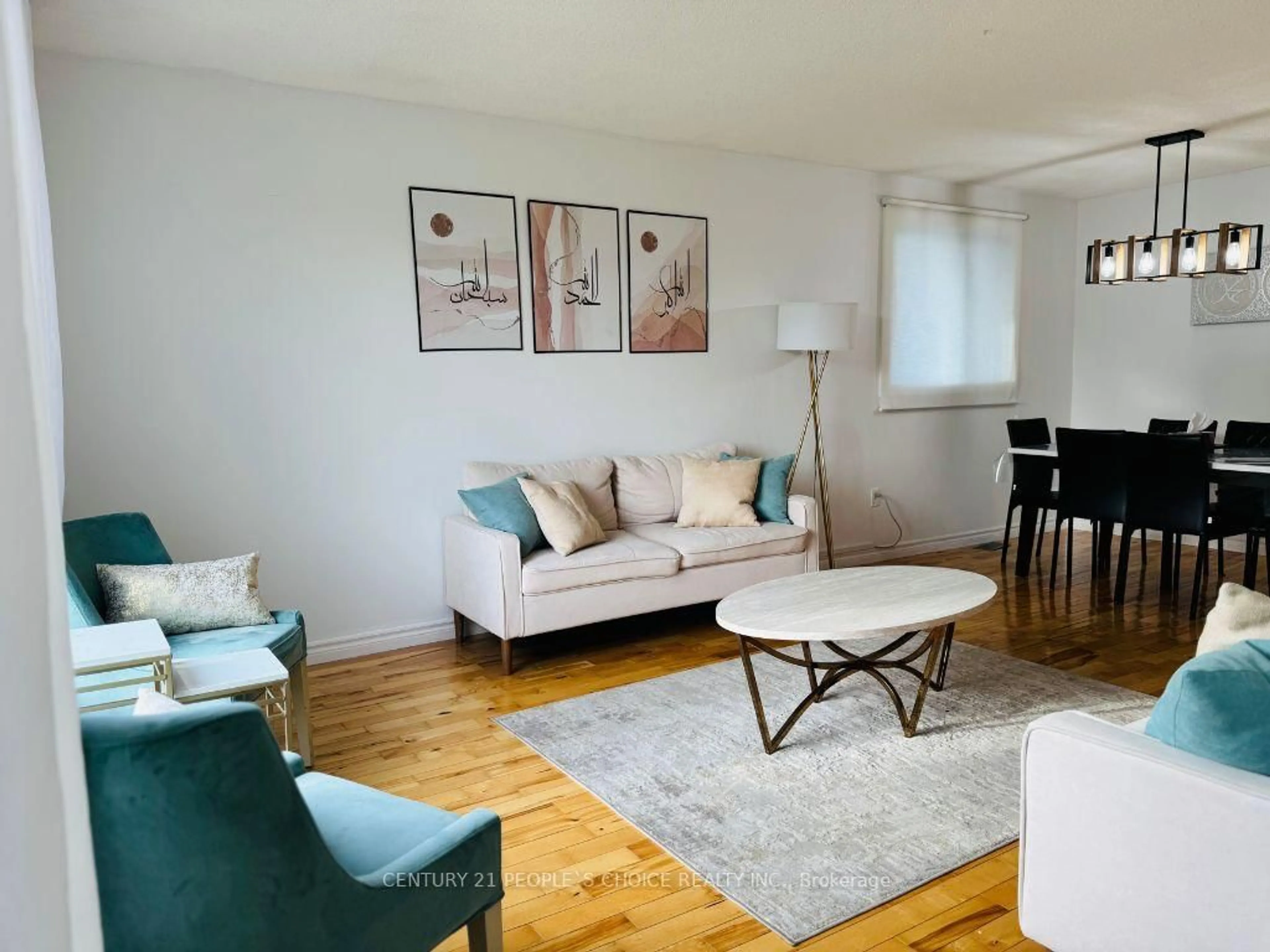 Living room with furniture, wood/laminate floor for 1436 Dearbourne Dr, Greater Sudbury Ontario P3A 5A4