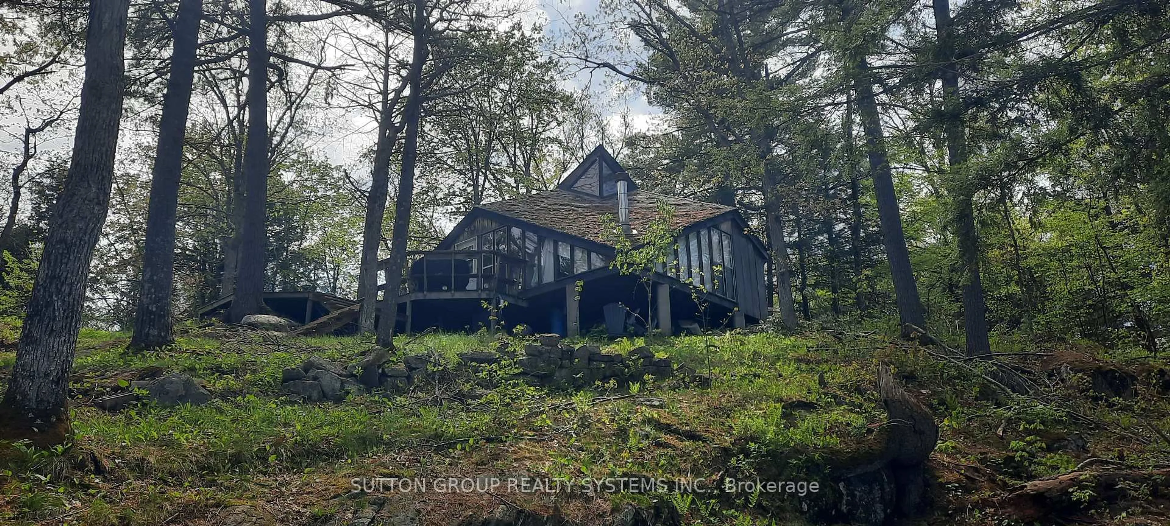 A pic from outside/outdoor area/front of a property/back of a property/a pic from drone, forest/trees view for 234 Healey Lake Water N/A, The Archipelago Ontario P0C 1H0