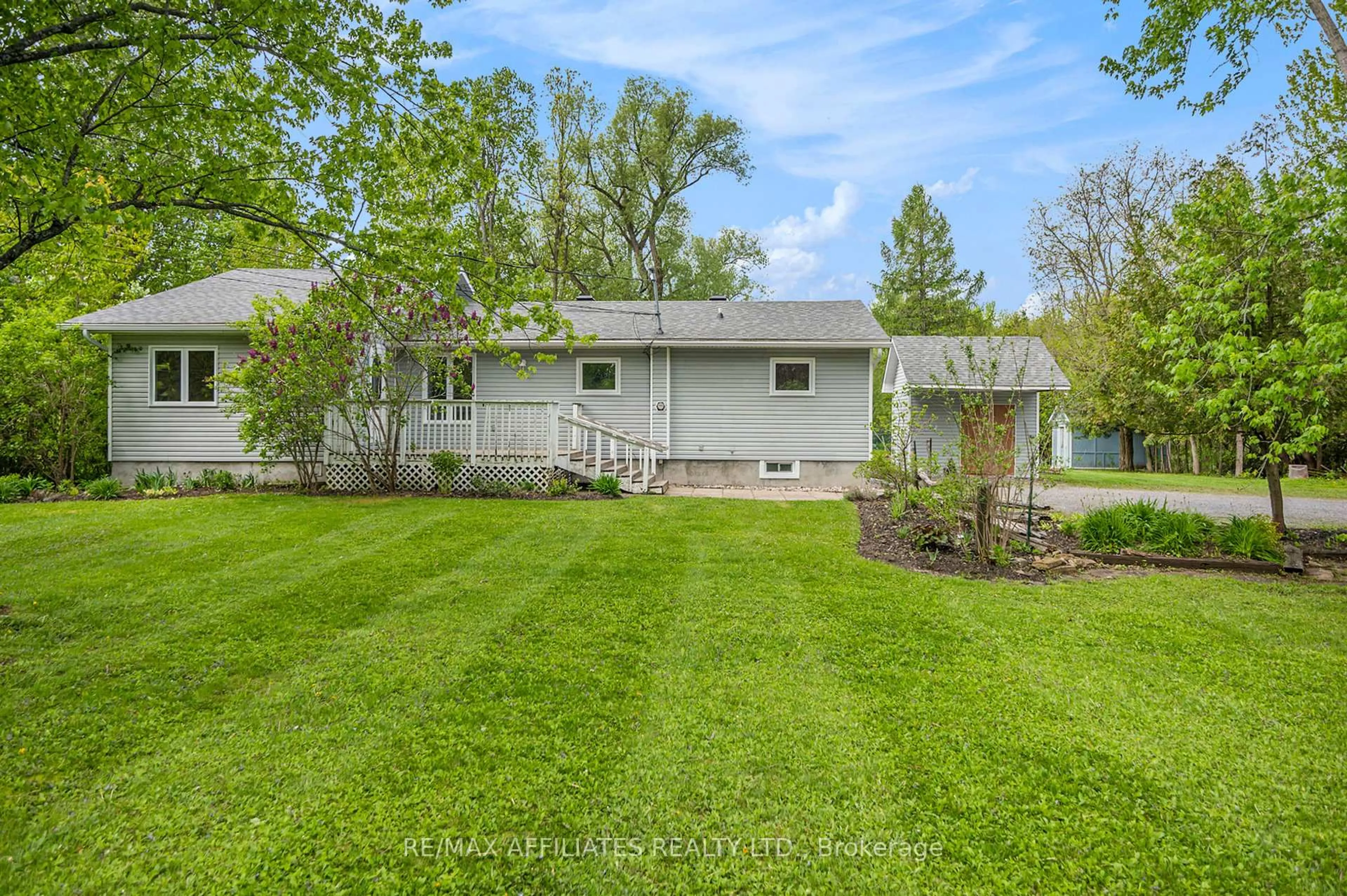 A pic from outside/outdoor area/front of a property/back of a property/a pic from drone, water/lake/river/ocean view for 303 Patty Lane, Carleton Place Ontario K7C 3P1
