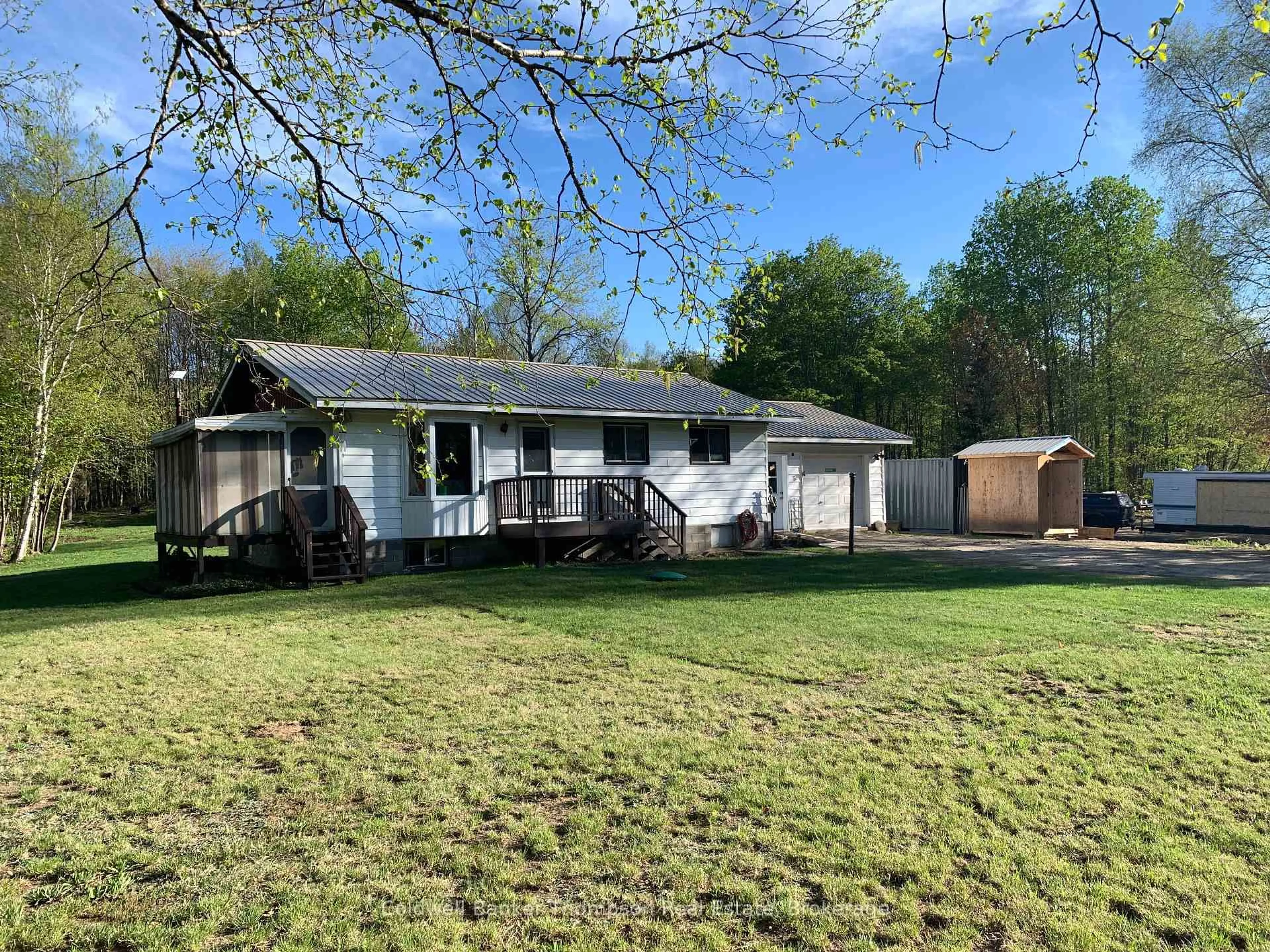 A pic from outside/outdoor area/front of a property/back of a property/a pic from drone, unknown for 51 Chrest Dr, Machar Ontario P0A 1X0