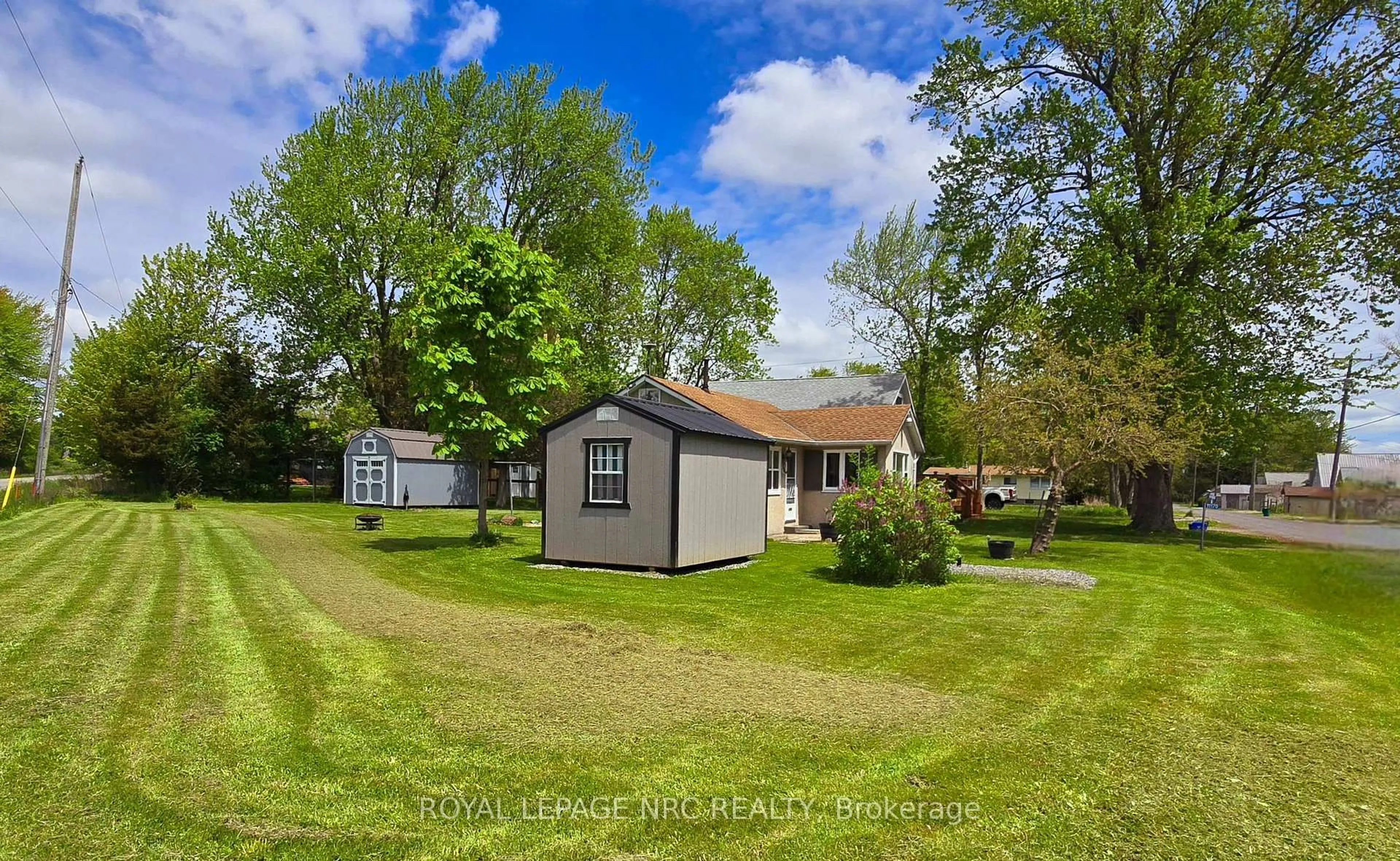 A pic from outside/outdoor area/front of a property/back of a property/a pic from drone, street for 11170 Churchill Ave, Wainfleet Ontario L3K 5V4