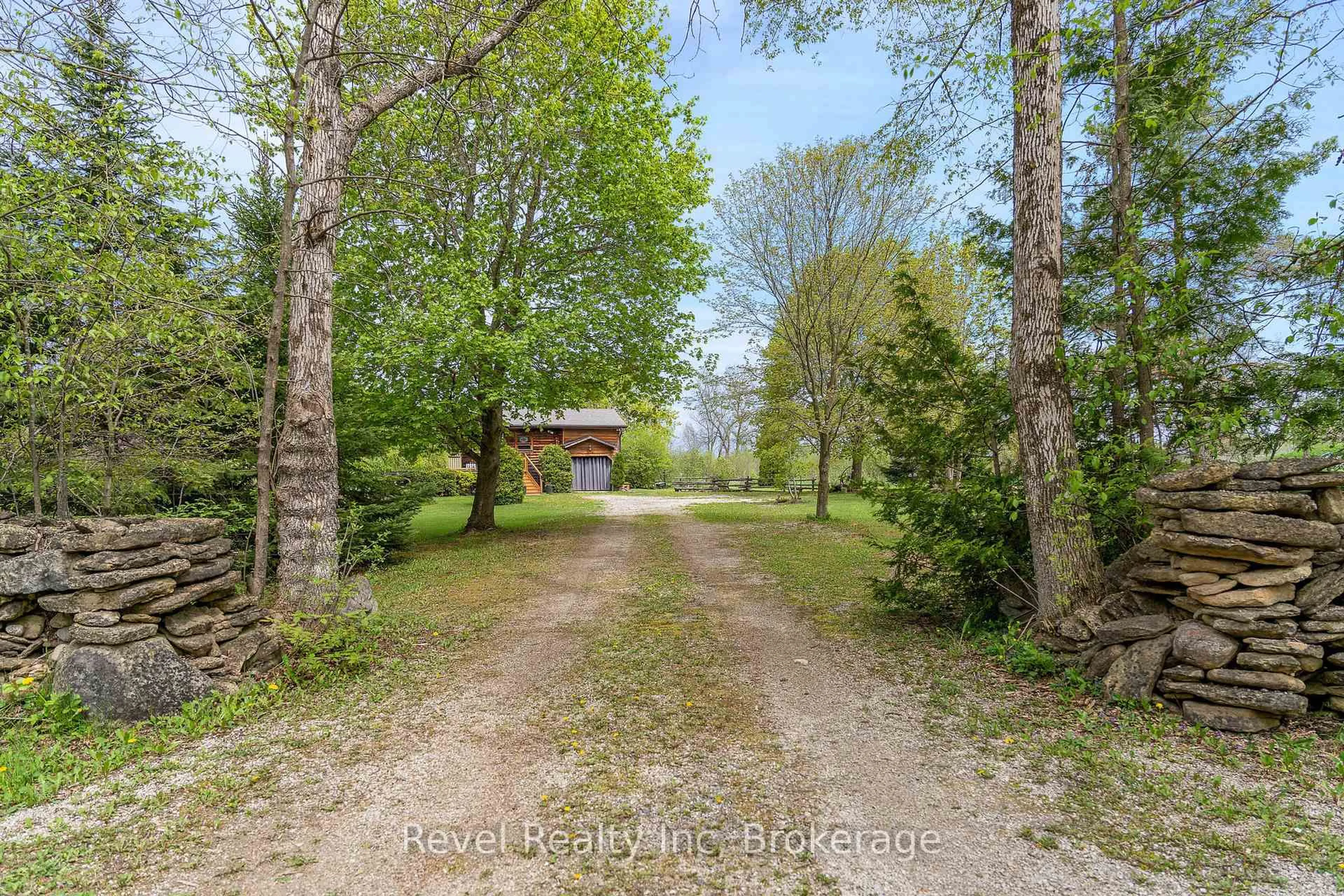 A pic from outside/outdoor area/front of a property/back of a property/a pic from drone, forest/trees view for 383349 Dawson Rd, Georgian Bluffs Ontario N0H 1S0