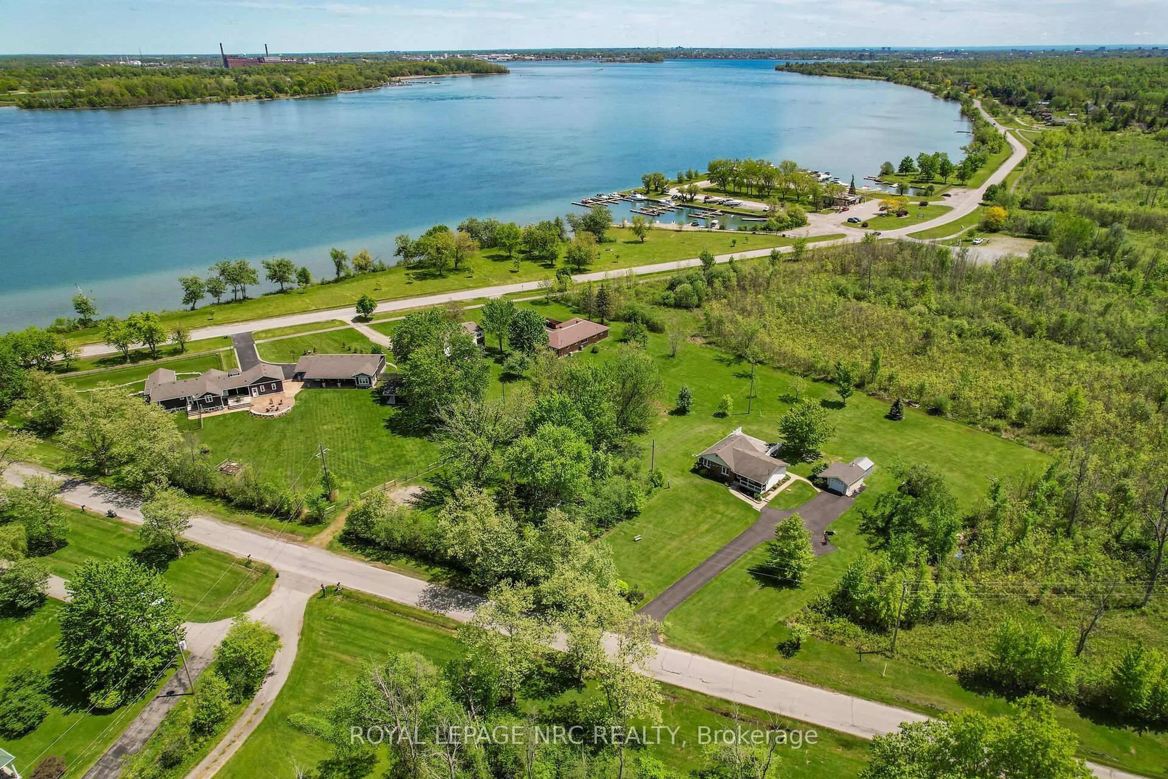 A pic from outside/outdoor area/front of a property/back of a property/a pic from drone, water/lake/river/ocean view for 410 Cairns Cres, Fort Erie Ontario L2A 5M4