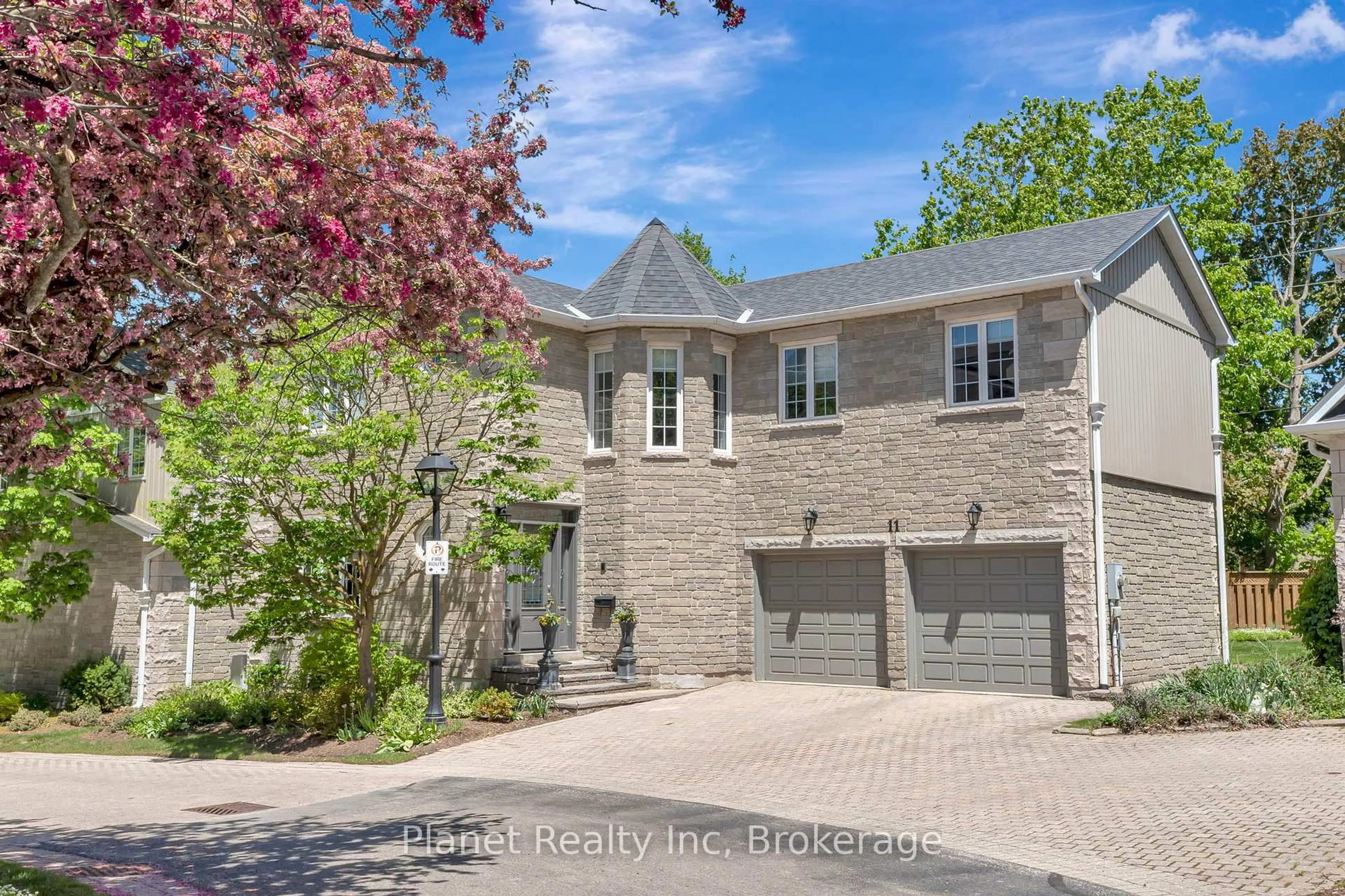 Home with brick exterior material, street for 25 Manor Park Cres #11, Guelph Ontario N1G 1A2