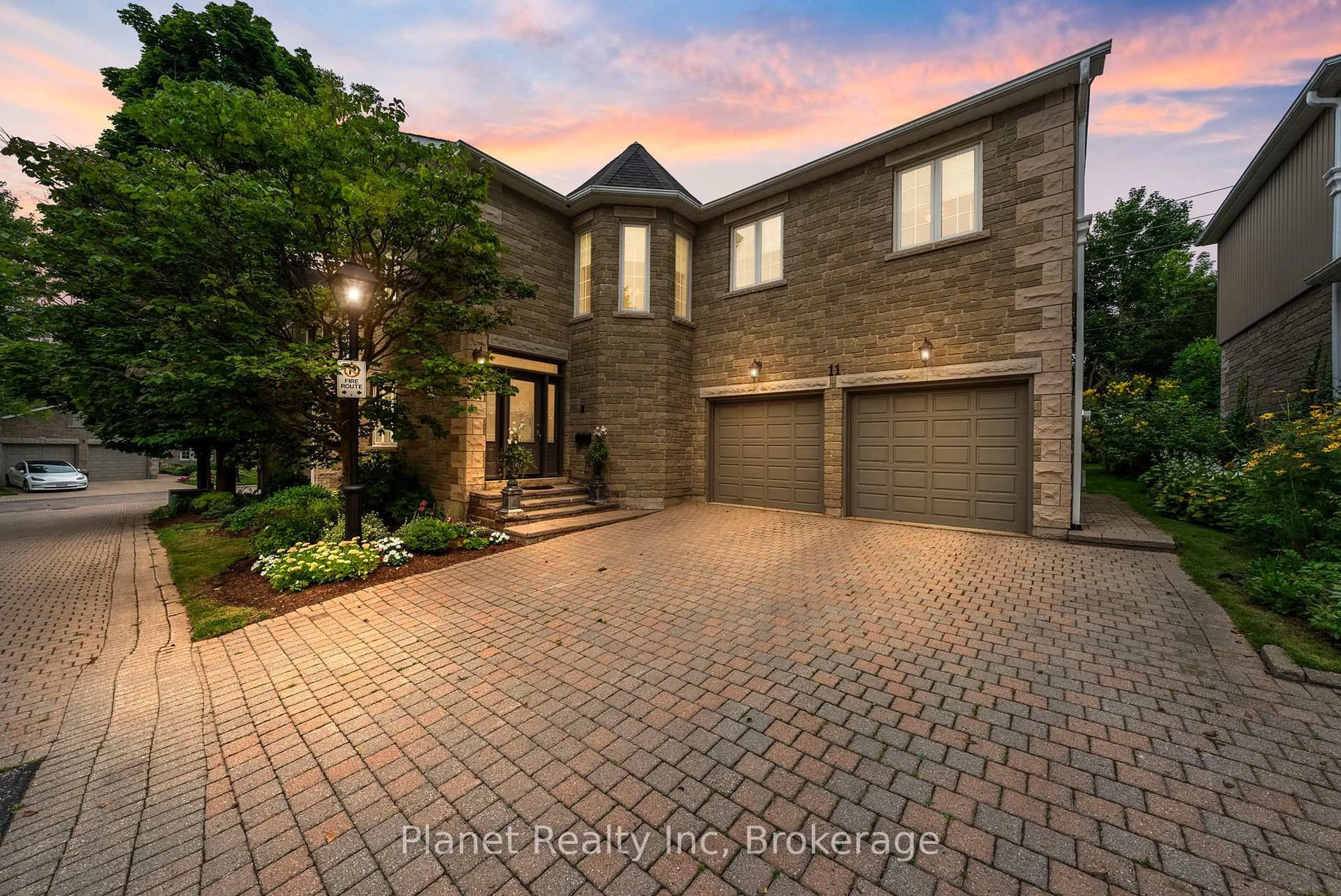 Home with brick exterior material, street for 25 Manor Park Cres #11, Guelph Ontario N1G 1A2