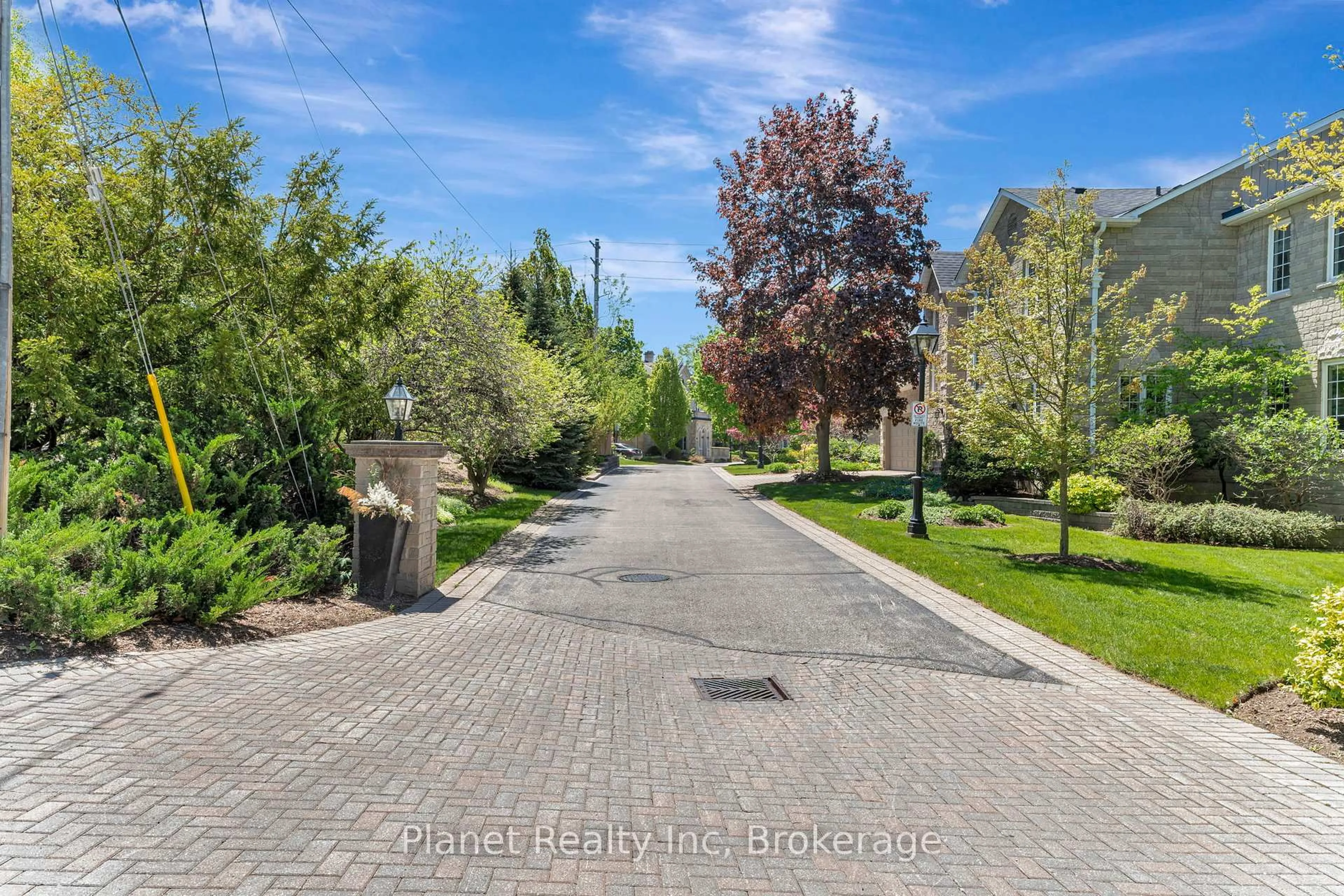 A pic from outside/outdoor area/front of a property/back of a property/a pic from drone, street for 25 Manor Park Cres #11, Guelph Ontario N1G 1A2