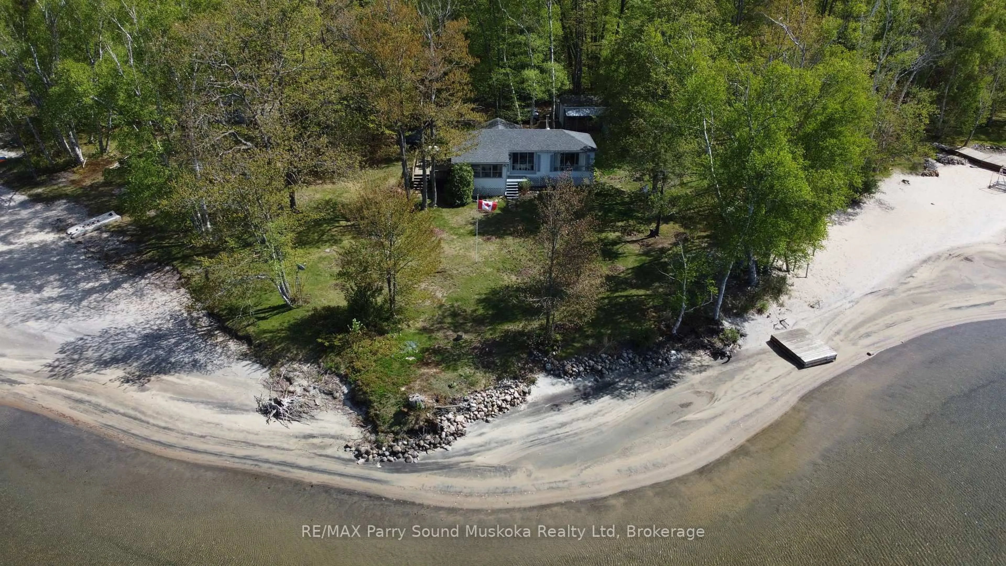 A pic from outside/outdoor area/front of a property/back of a property/a pic from drone, water/lake/river/ocean view for 586 Rose Island Dr, Parry Sound Ontario P2A 2X4