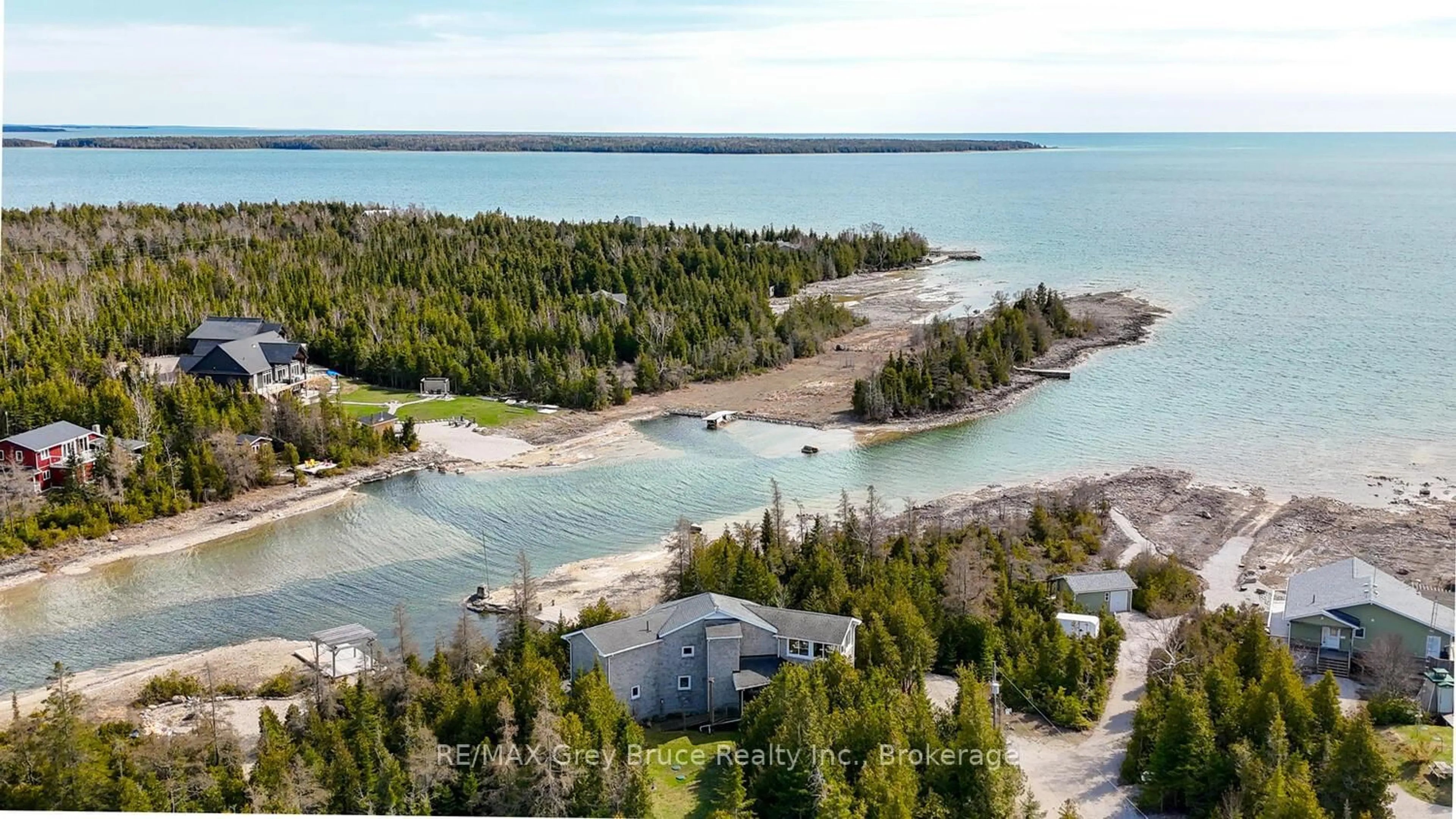 A pic from outside/outdoor area/front of a property/back of a property/a pic from drone, water/lake/river/ocean view for 41 Boyds Harbour Loop, Northern Bruce Peninsula Ontario N0H 1W0