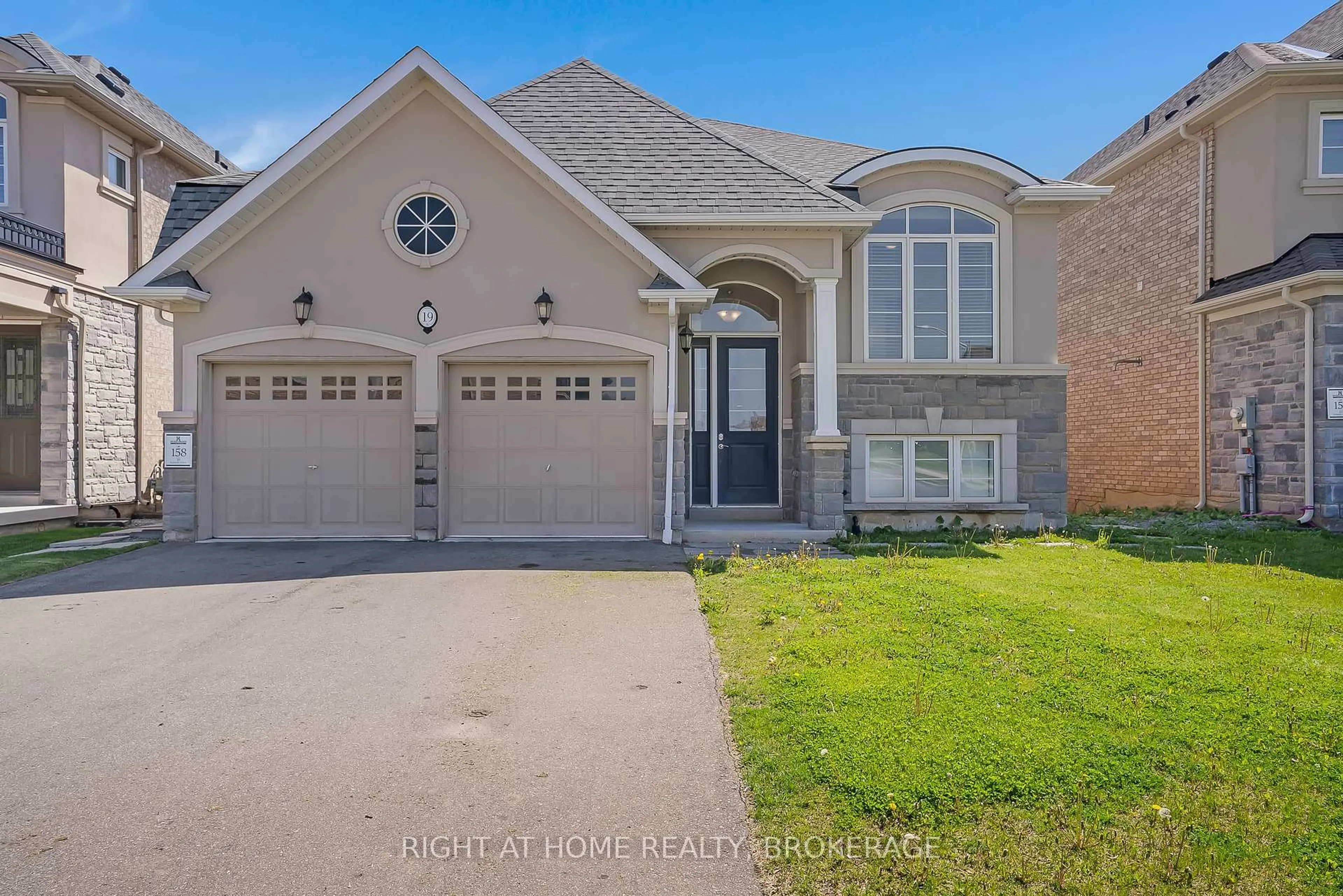 Home with brick exterior material, street for 19 Robarts Dr, Hamilton Ontario L9K 0H5