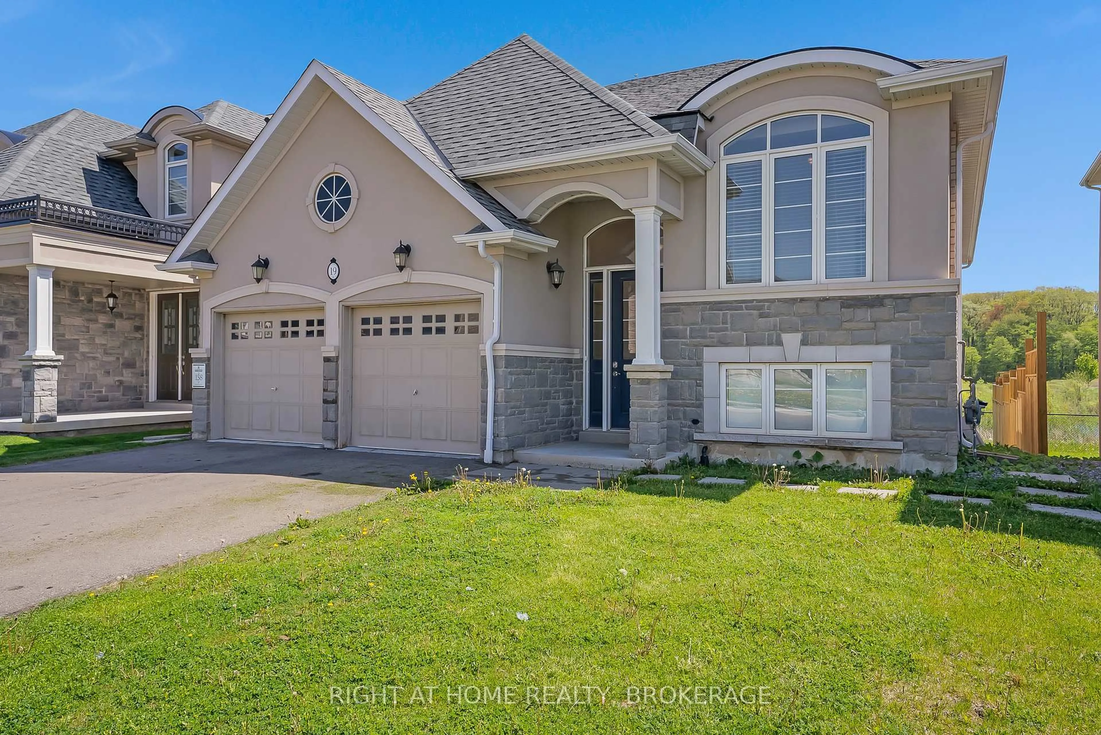 Home with brick exterior material, street for 19 Robarts Dr, Hamilton Ontario L9K 0H5