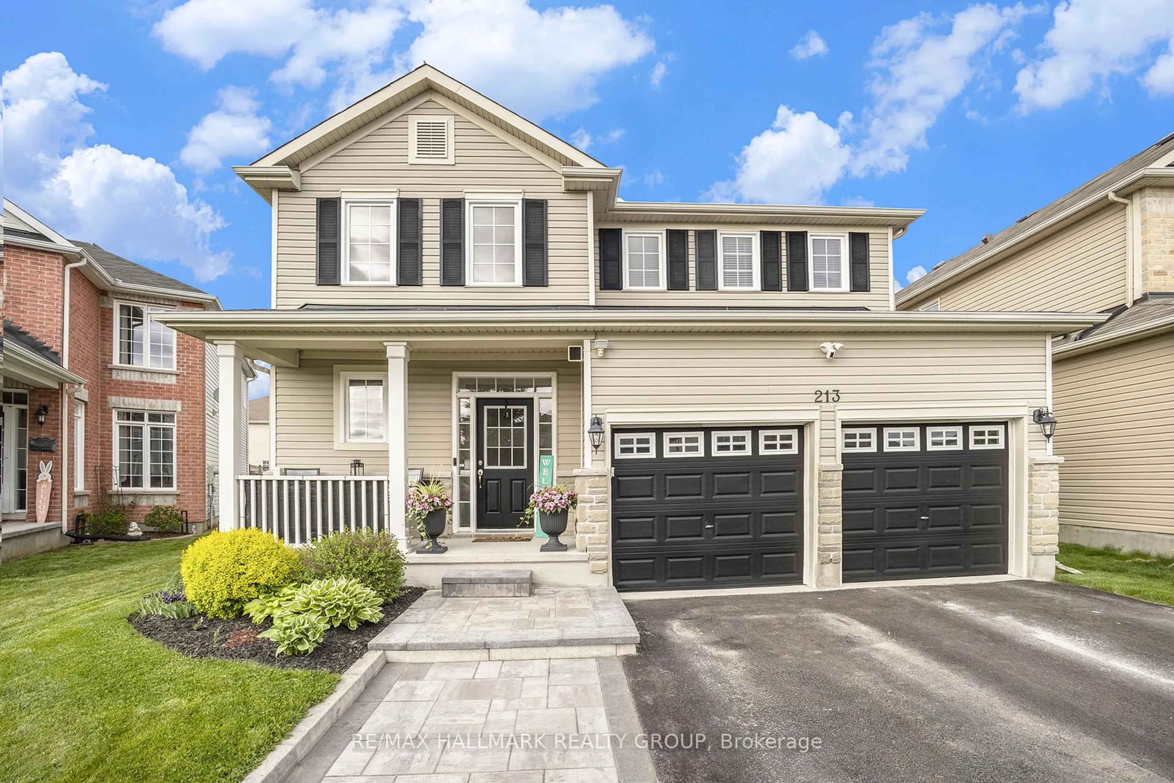 Home with vinyl exterior material, street for 213 Pendra Way, Ottawa Ontario K2W 0A6