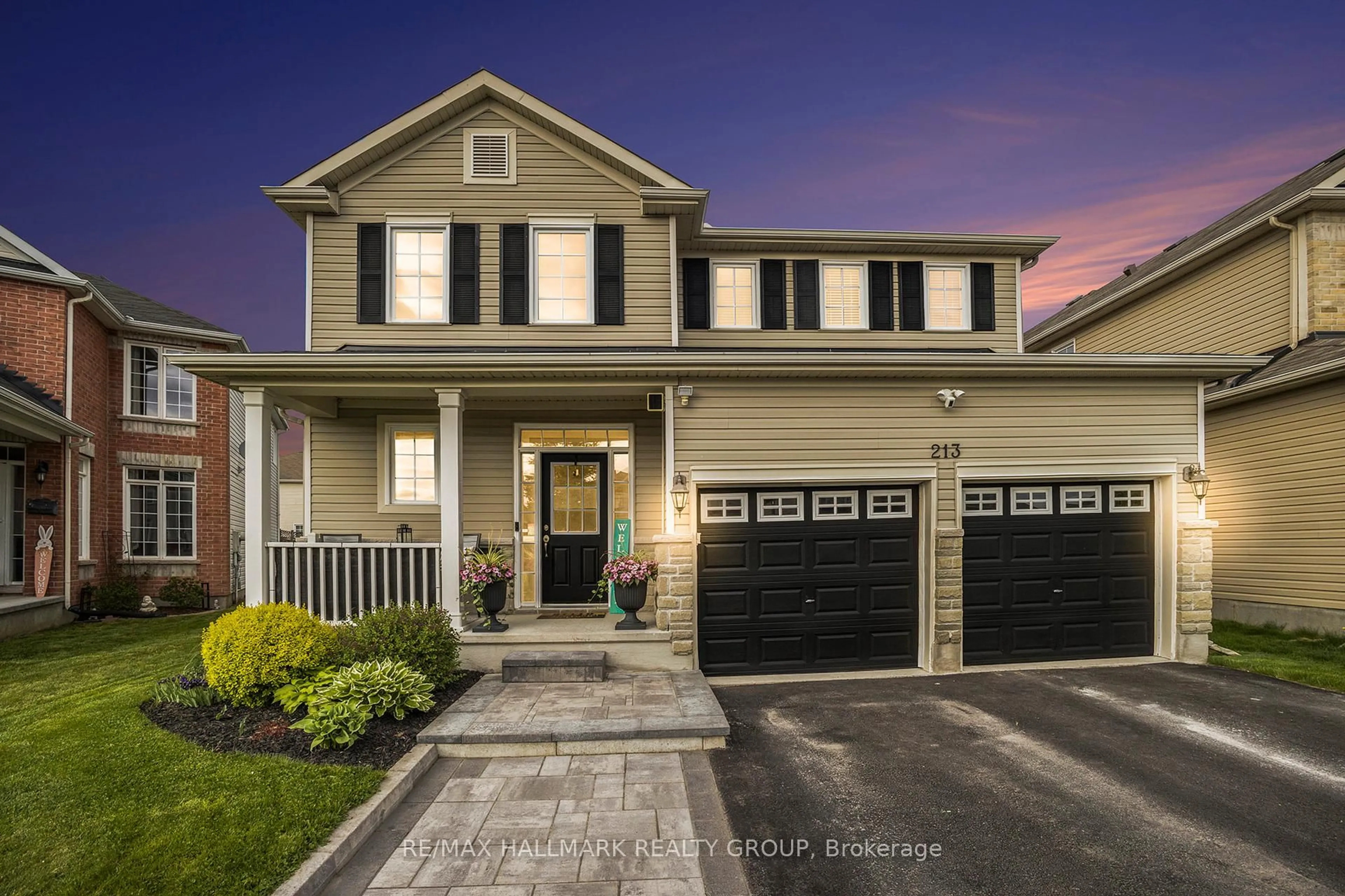 Home with vinyl exterior material, street for 213 Pendra Way, Ottawa Ontario K2W 0A6