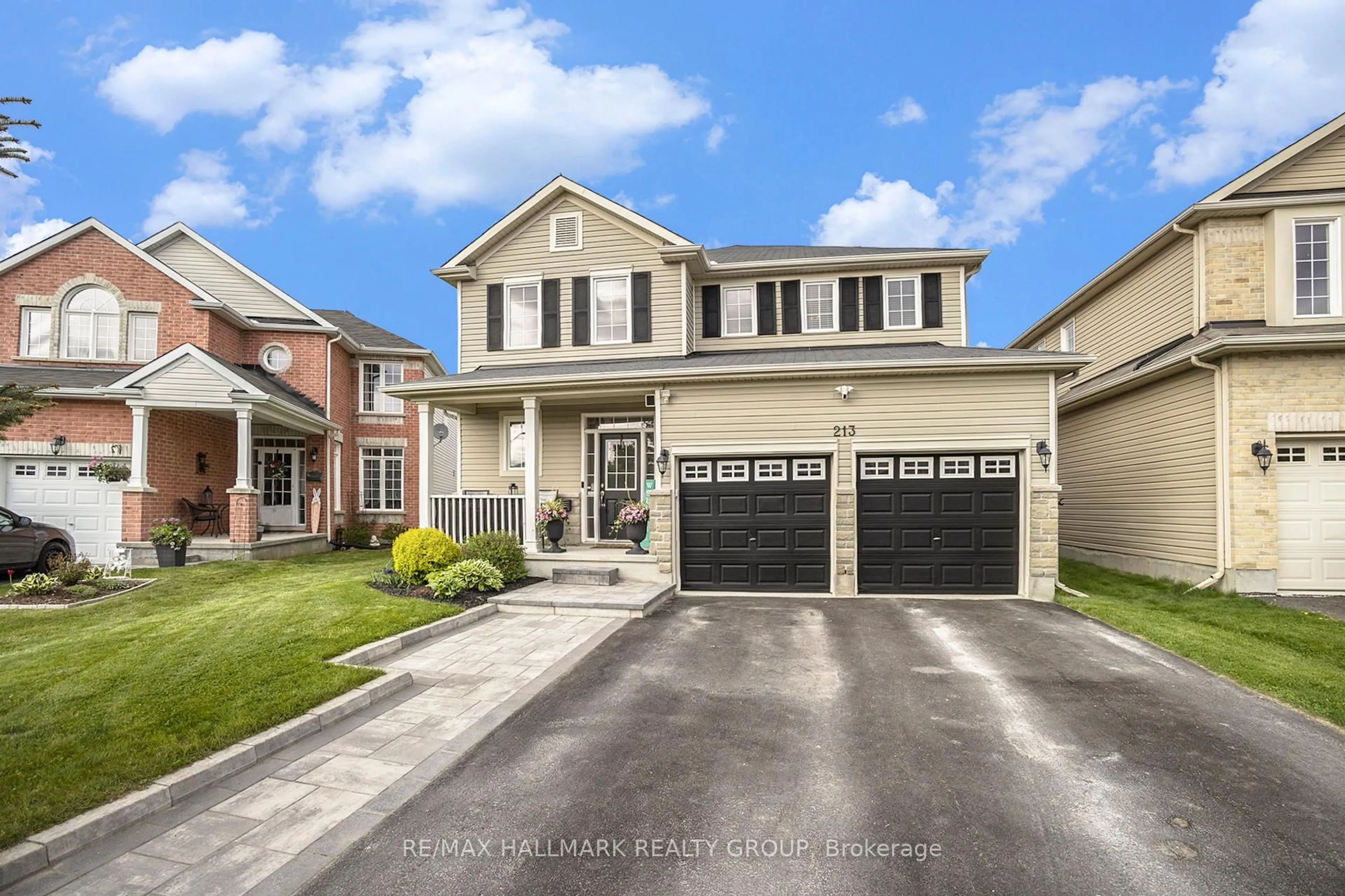 Home with vinyl exterior material, street for 213 Pendra Way, Ottawa Ontario K2W 0A6