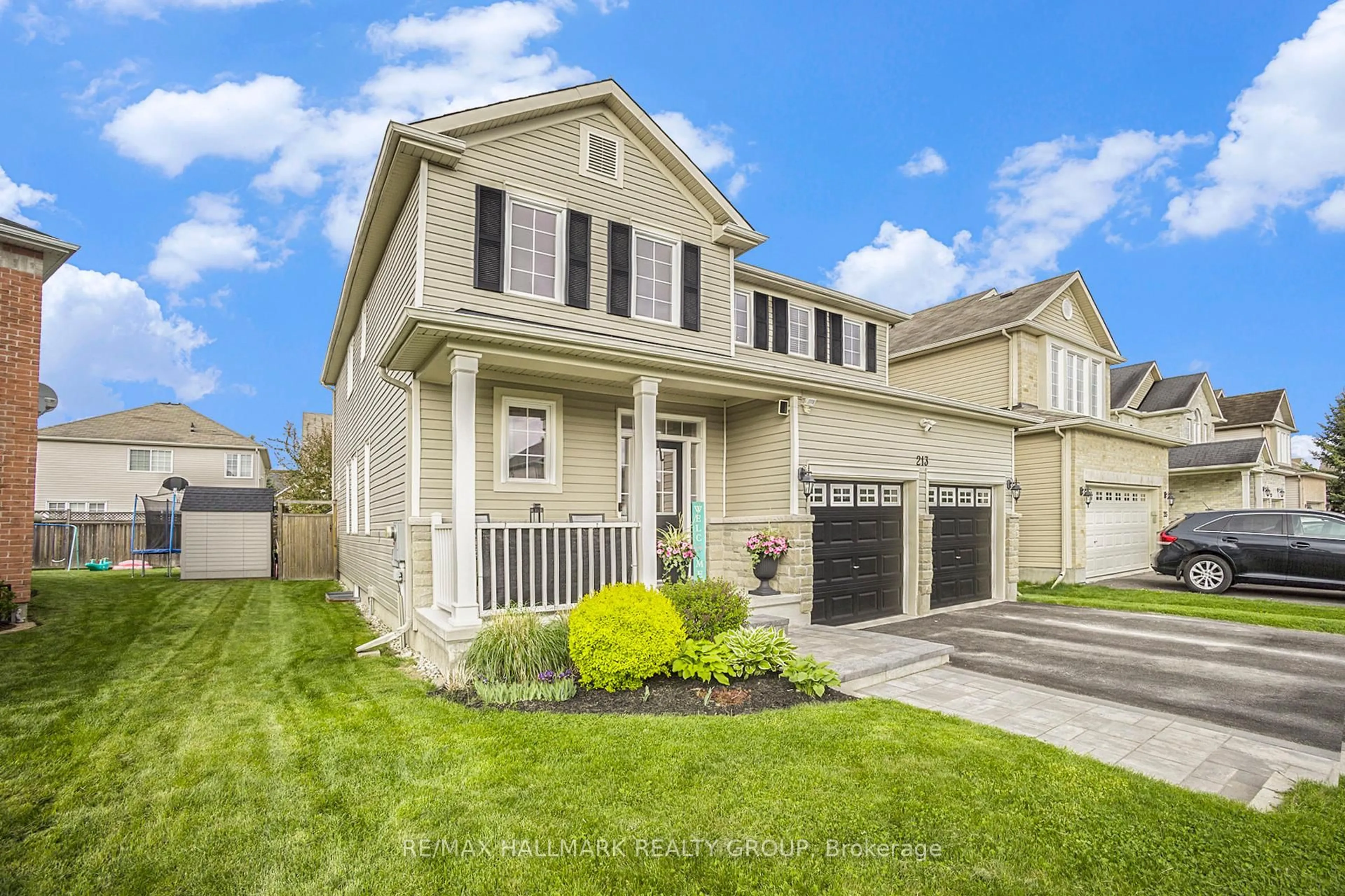 Home with vinyl exterior material, street for 213 Pendra Way, Ottawa Ontario K2W 0A6