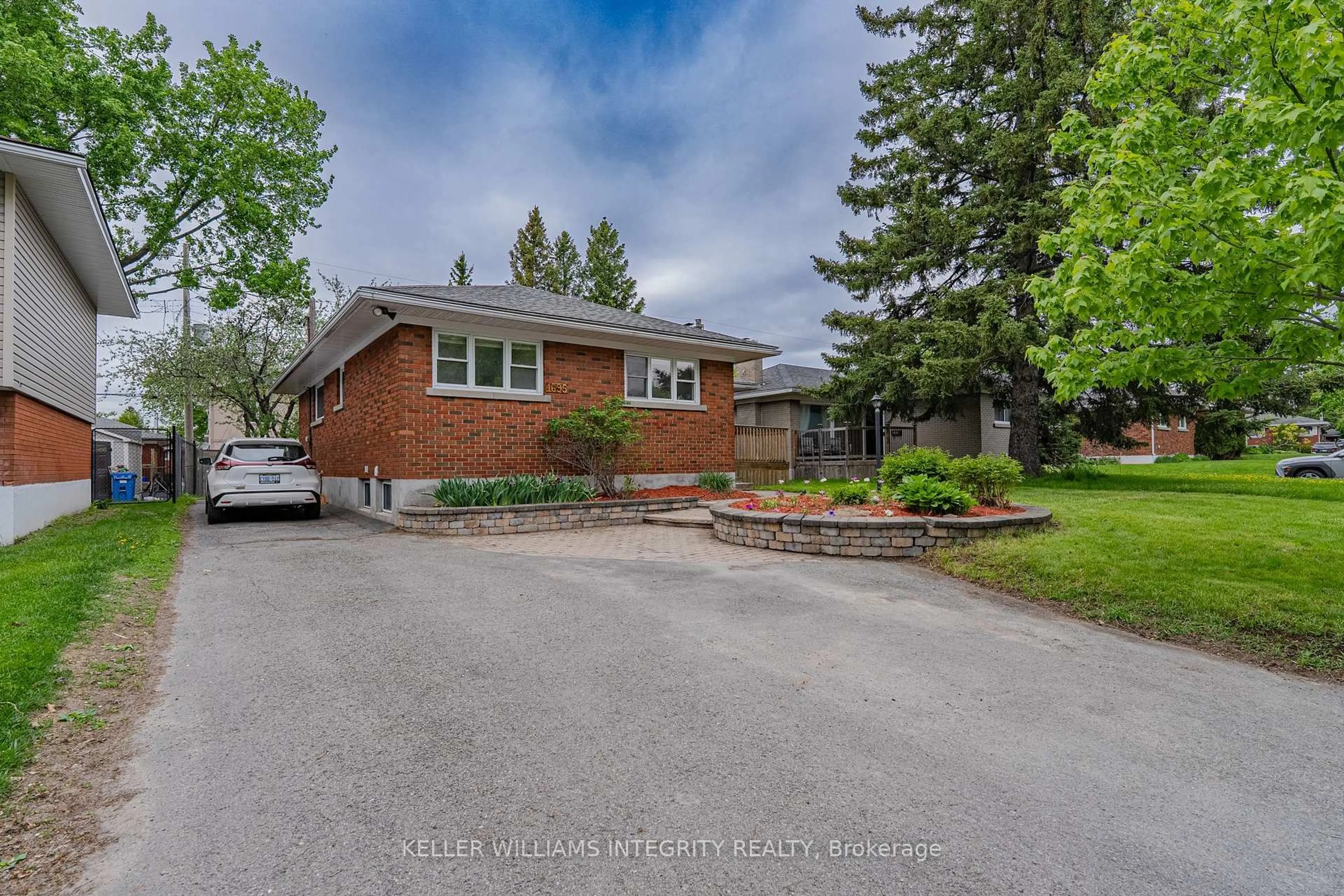 Home with brick exterior material, street for 1695 Gage Cres, Ottawa Ontario K2C 0Z7