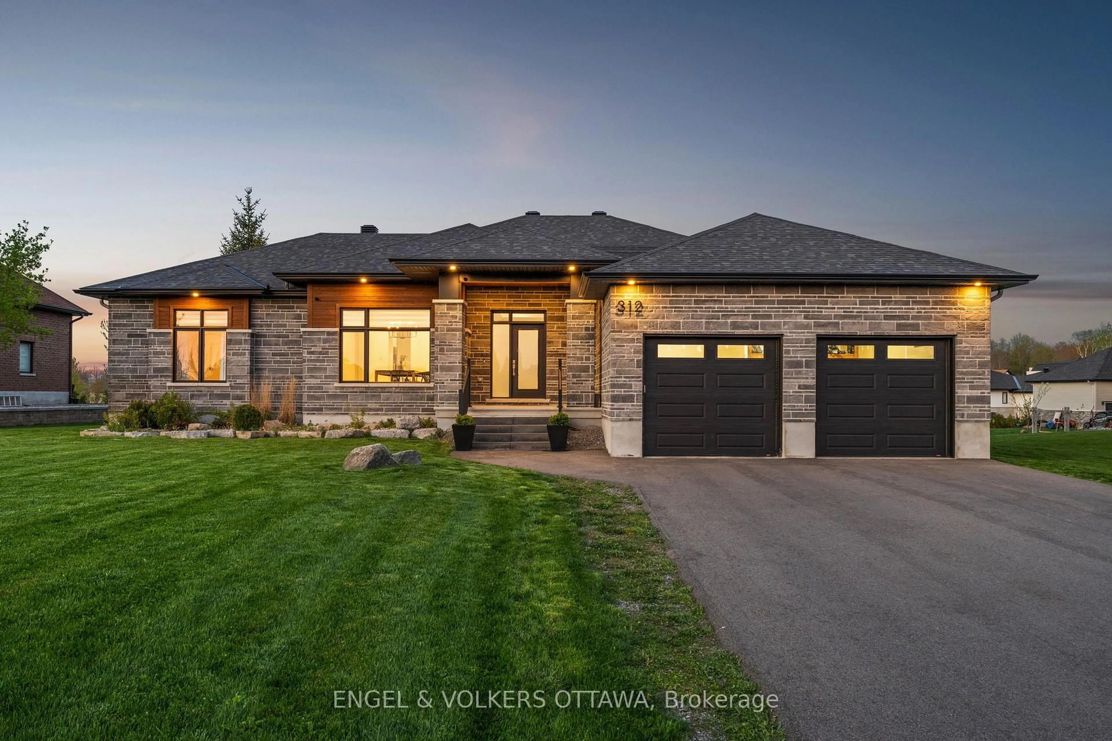 Home with brick exterior material, street for 312 Shoreway Drive. Dr, Greely Ontario K4P 0G2
