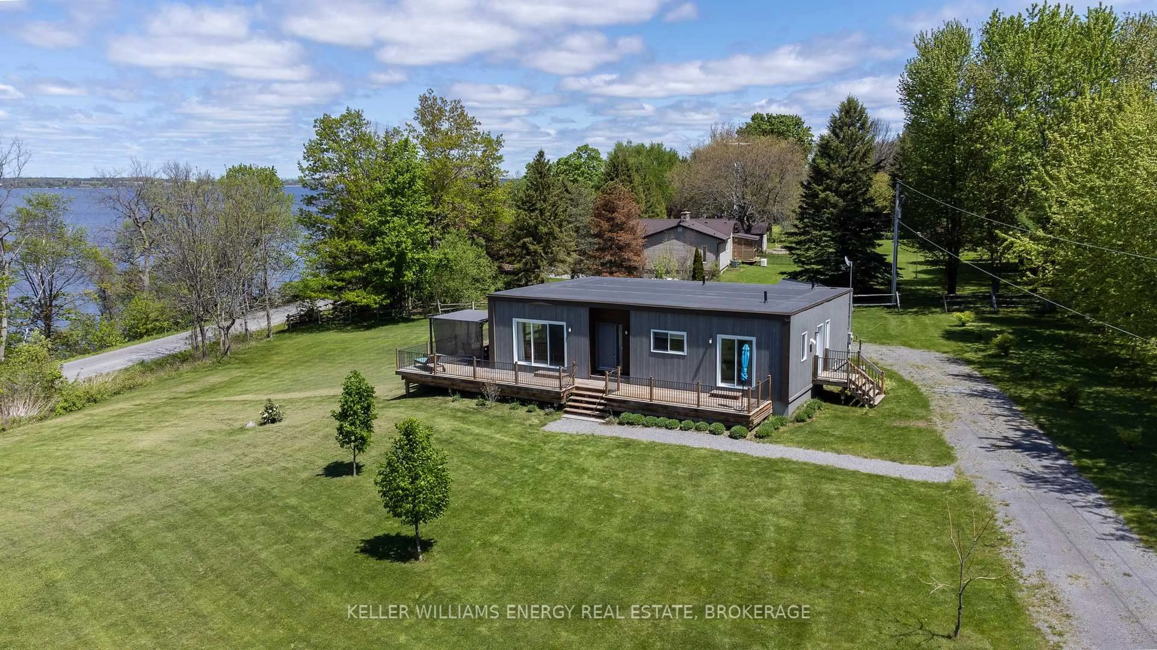 A pic from outside/outdoor area/front of a property/back of a property/a pic from drone, water/lake/river/ocean view for 326 Cressy Bayside Rd, Prince Edward County Ontario K0K 2T0