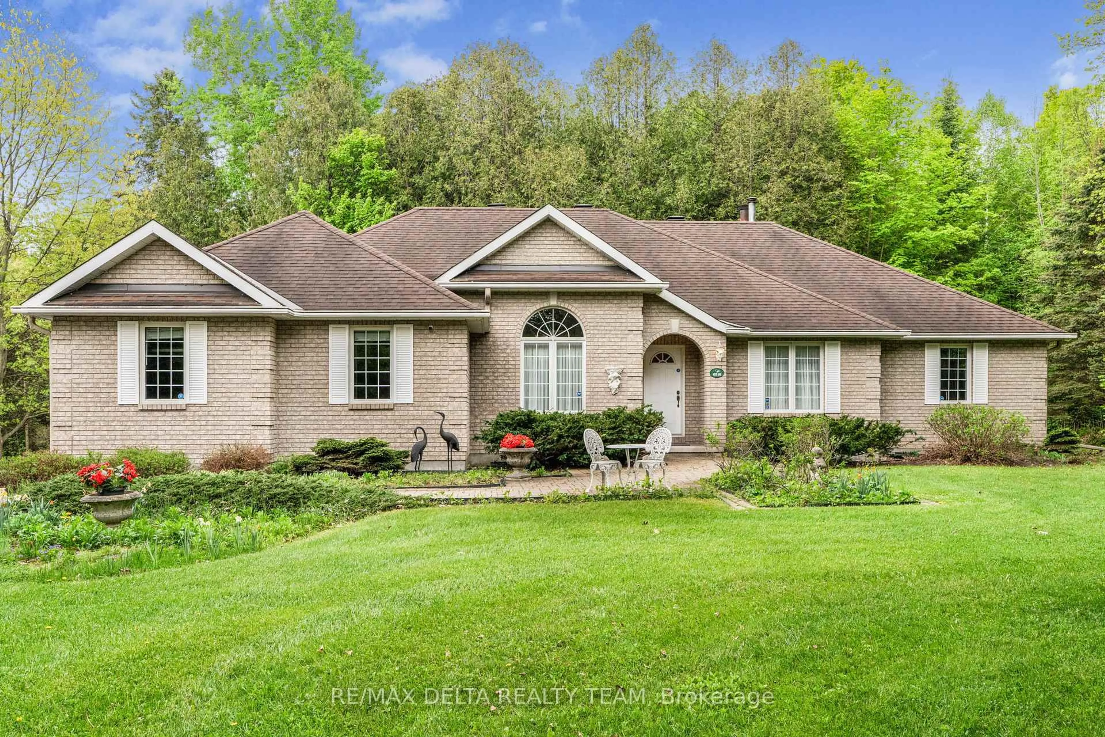 Home with brick exterior material, water/lake/river/ocean view for 6316 Elkwood Dr, Ottawa Ontario K4P 1N1