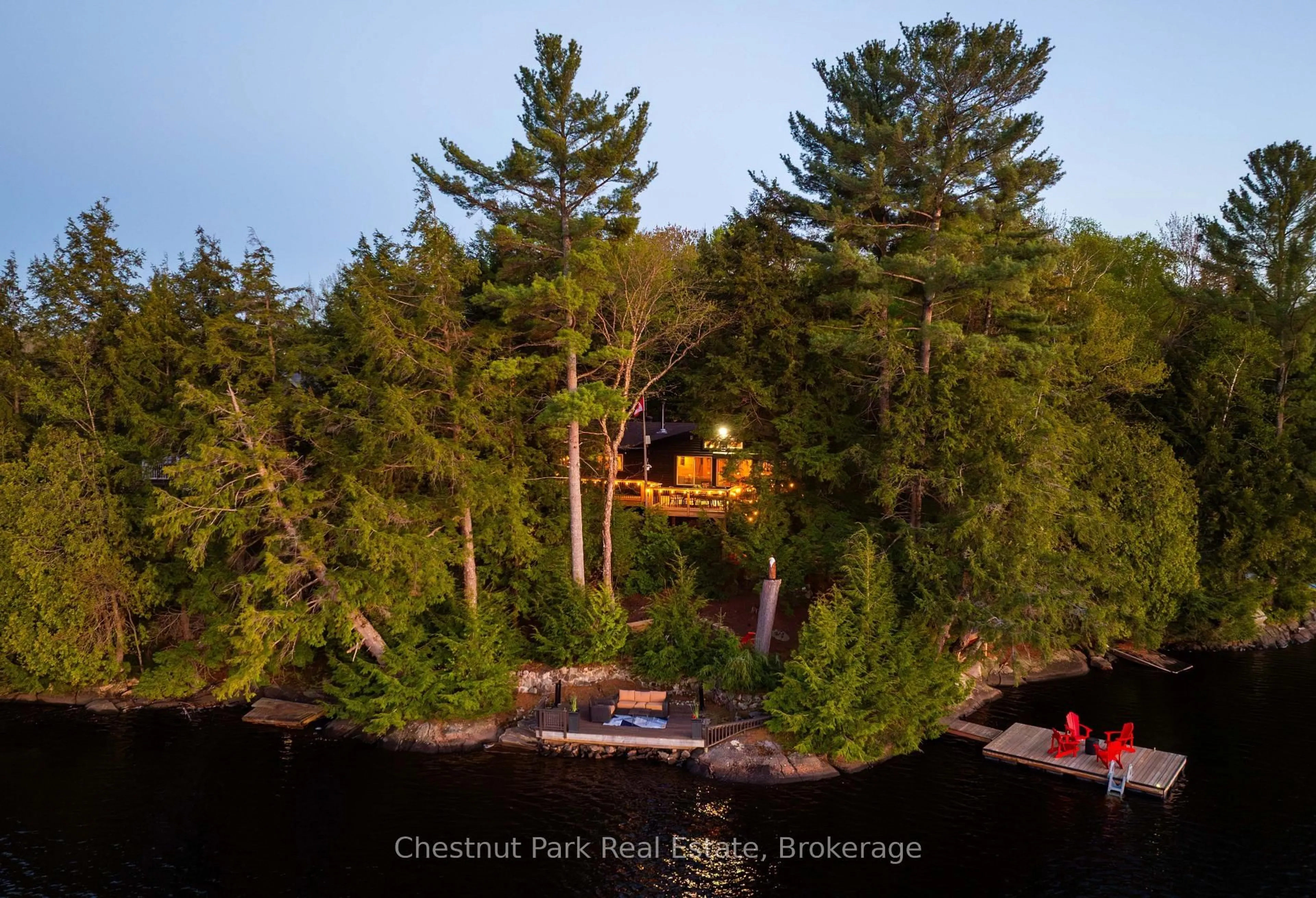 A pic from outside/outdoor area/front of a property/back of a property/a pic from drone, forest/trees view for 12 Hilltop Lane, Seguin Ontario P0C 1J0