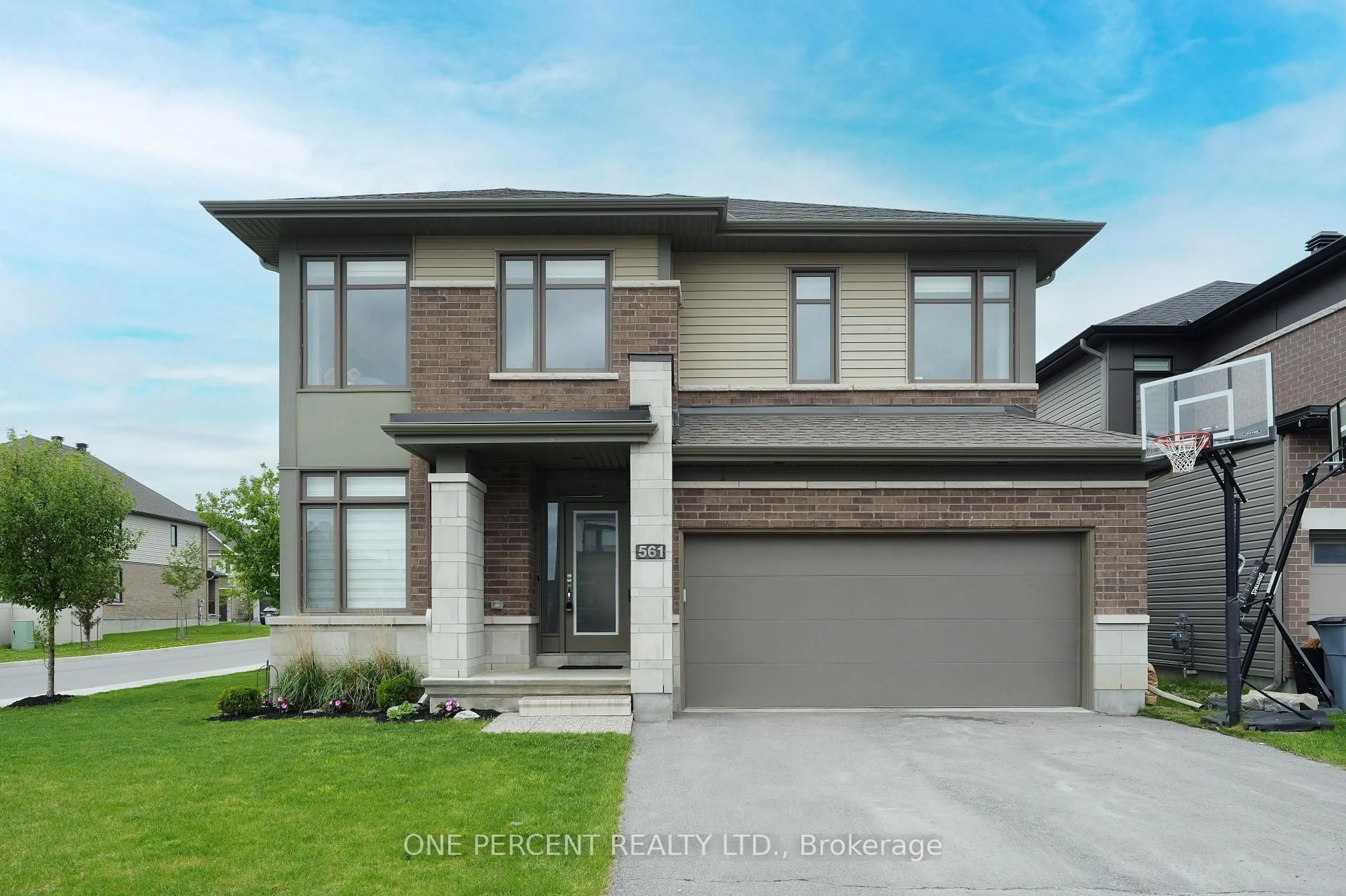 Home with brick exterior material, street for 561 Bobolink Rdge, Ottawa Ontario K2S 2P2