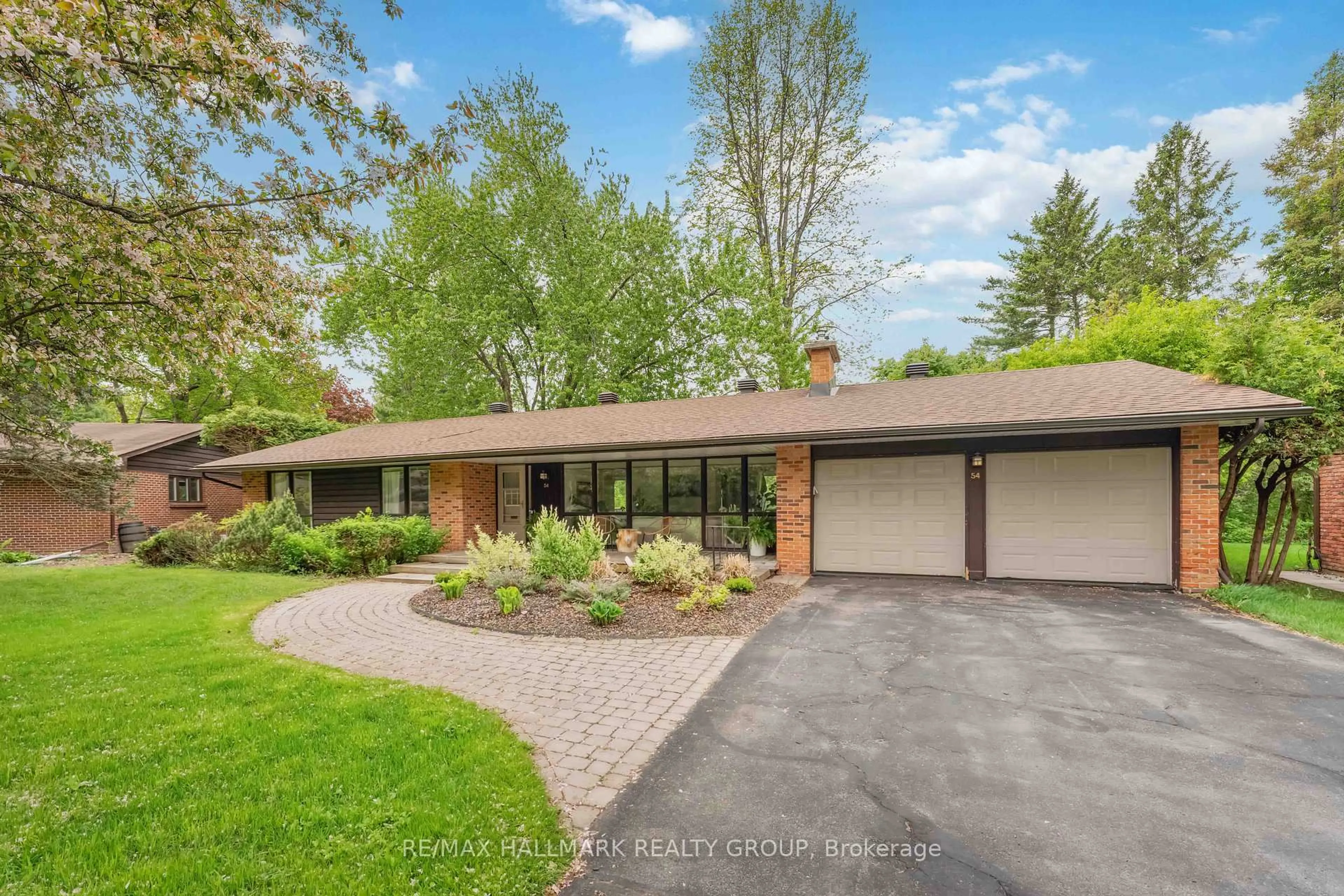 Home with brick exterior material, street for 54 Lismer Cres, Kanata Ontario K2K 1A2