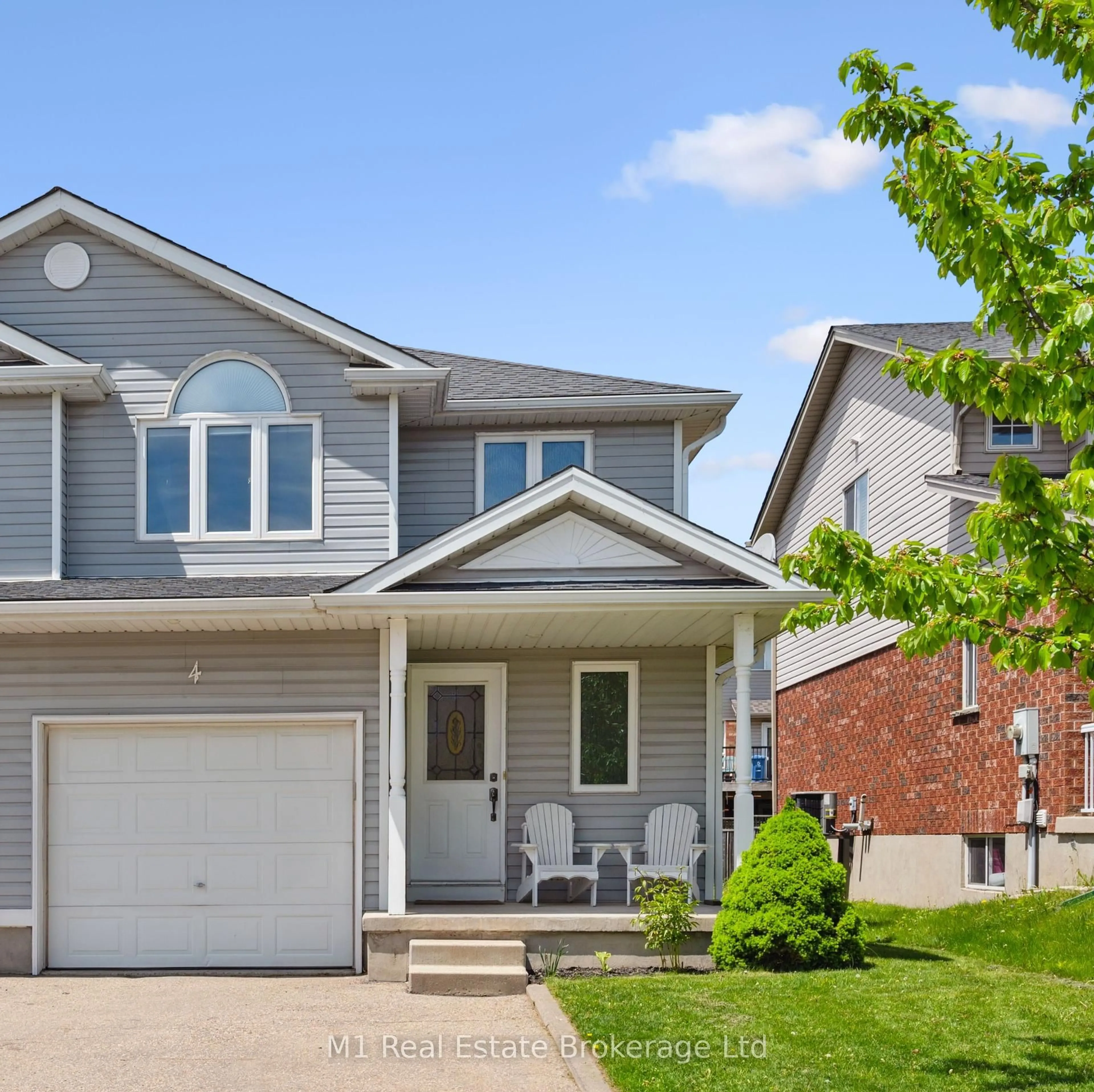 Home with vinyl exterior material, street for 4 Sandcreek Lane, Guelph Ontario N1E 7K7