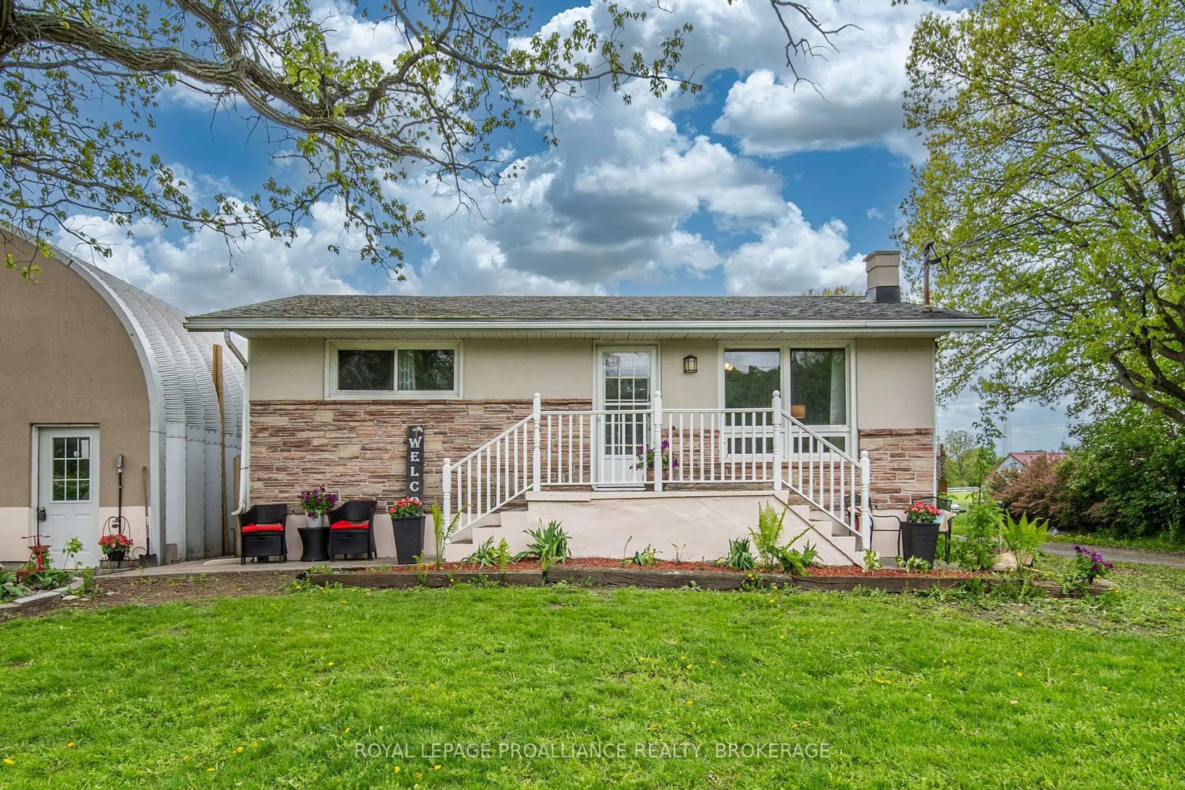 Home with vinyl exterior material, street for 1911 Unity Rd, Mcdonalds Corners Ontario K0H 1M0