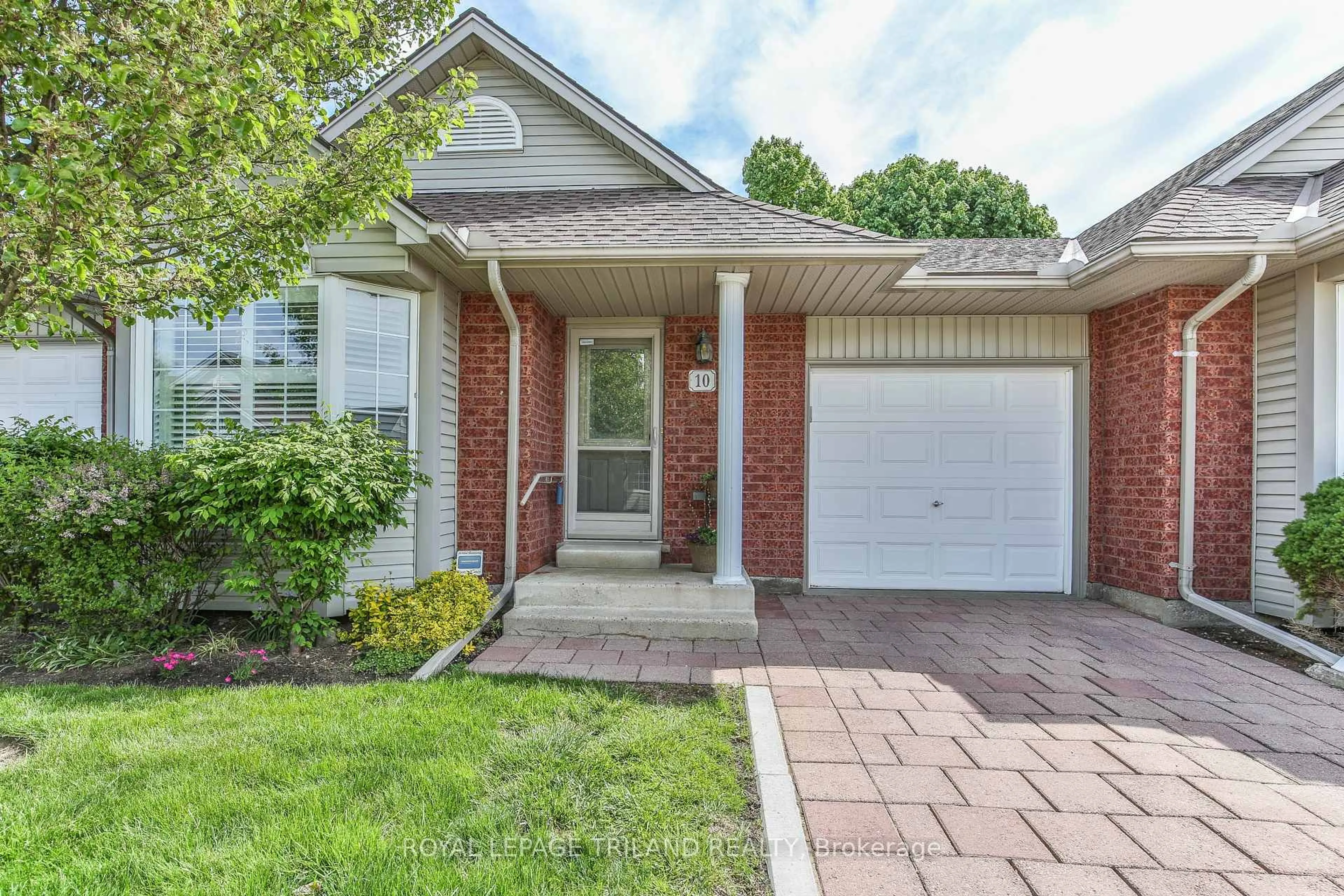 Home with brick exterior material, street for 1555 Highbury Ave #10, London East Ontario N5Y 5R2