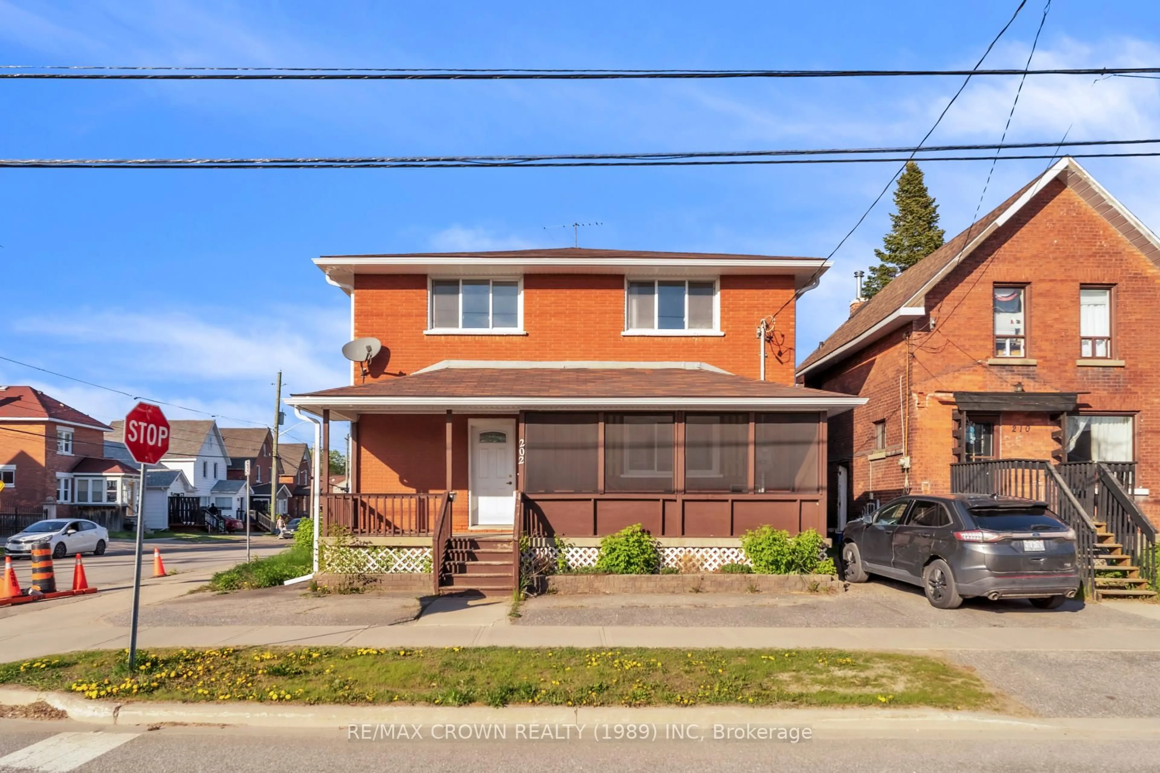 Home with brick exterior material, street for 202 First Ave, North Bay Ontario P1B 1J8