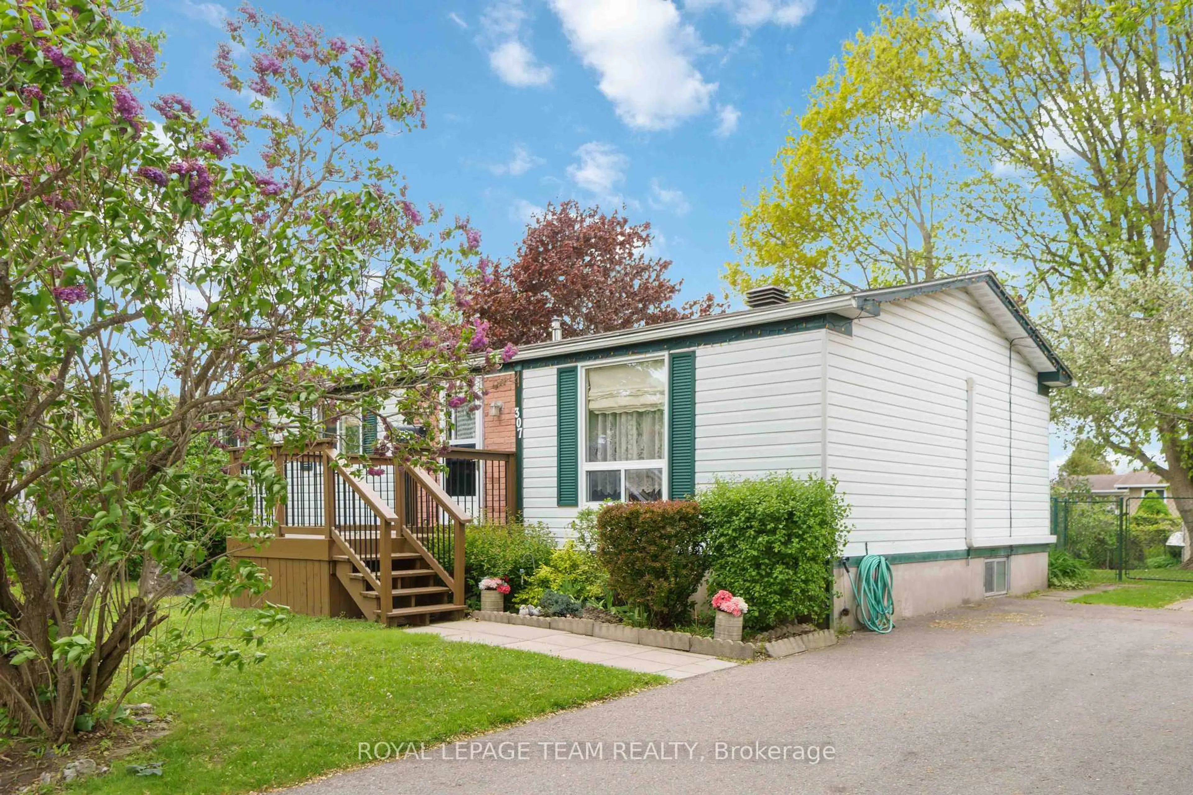 Home with vinyl exterior material, street for 307 Dodson St, North Grenville Ontario K0G 1J0