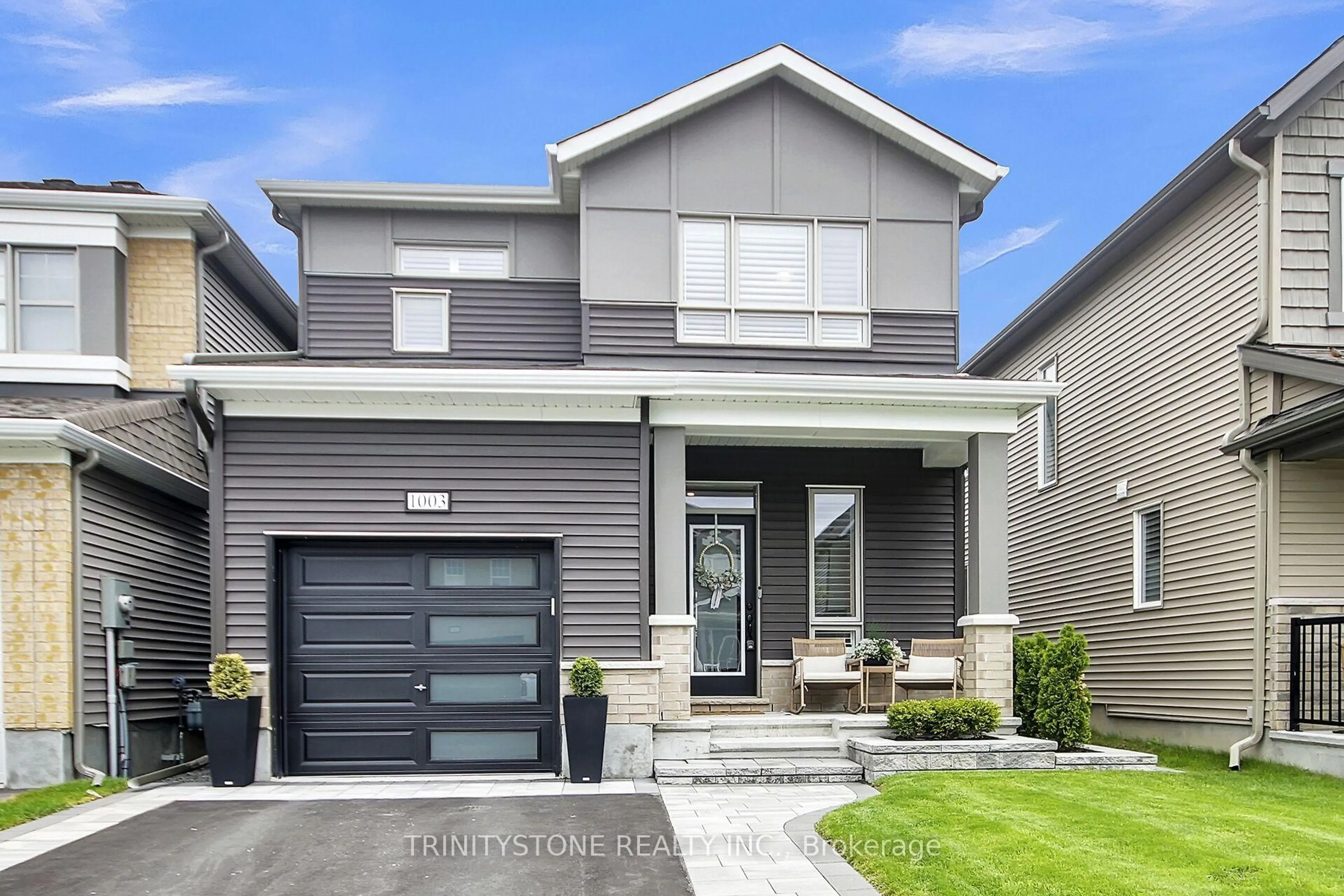 Home with vinyl exterior material, street for 1003 Cottontail Walk, Orleans Ontario K4A 5H6