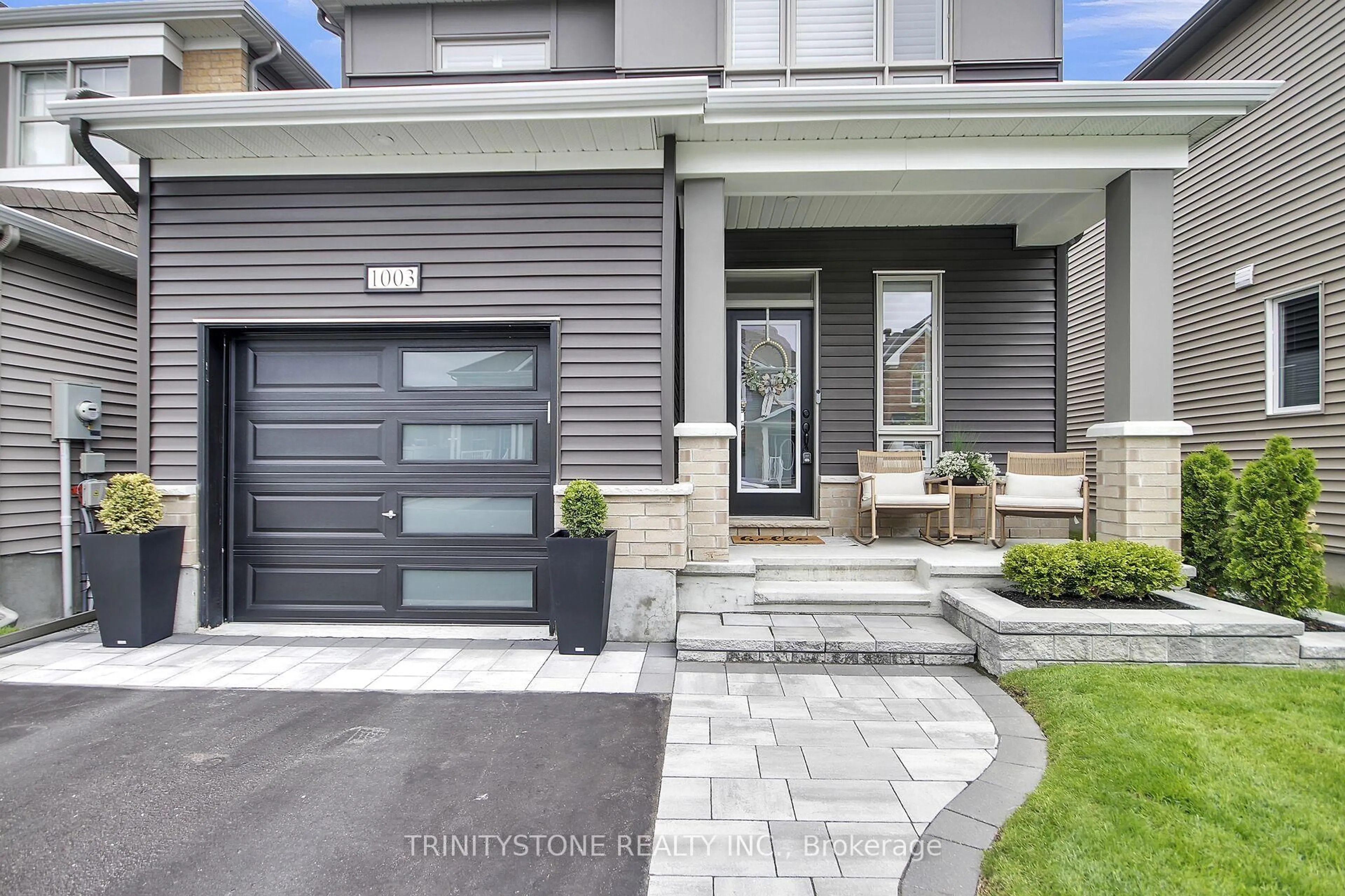 Home with brick exterior material, street for 1003 Cottontail Walk, Orleans Ontario K4A 5H6