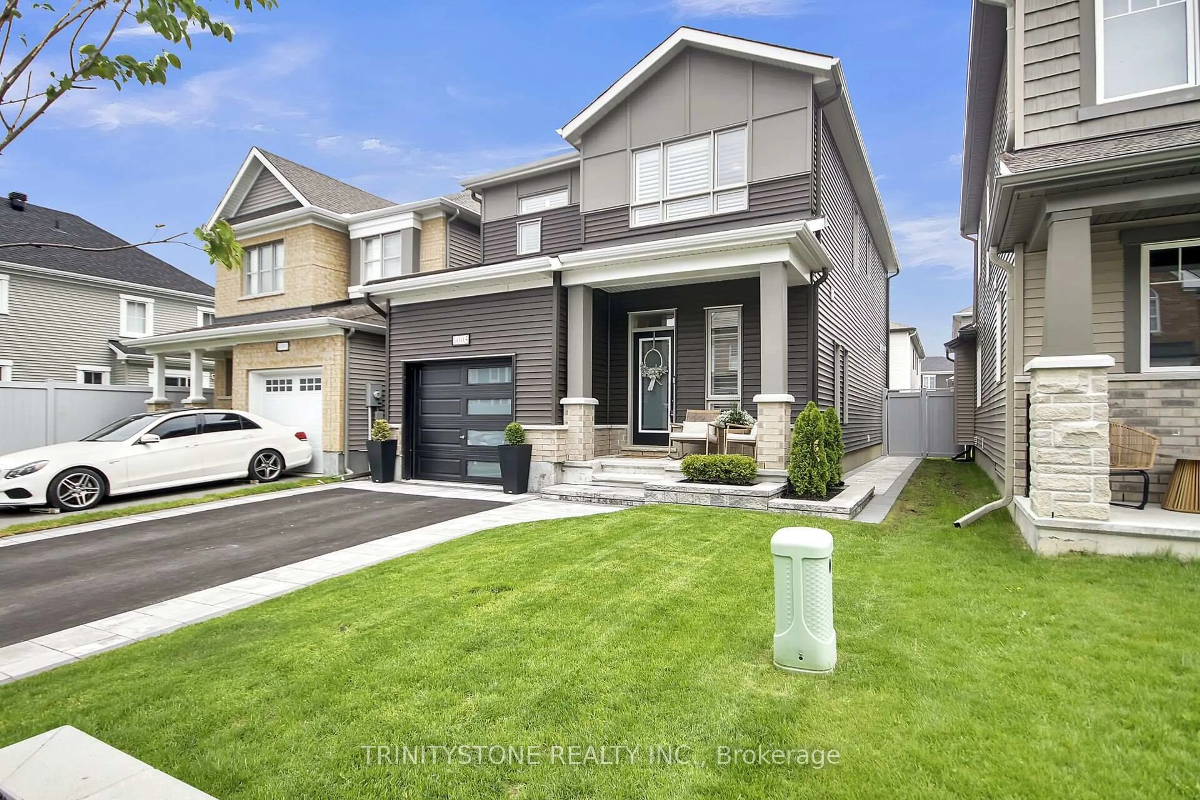 Home with brick exterior material, street for 1003 Cottontail Walk, Orleans Ontario K4A 5H6