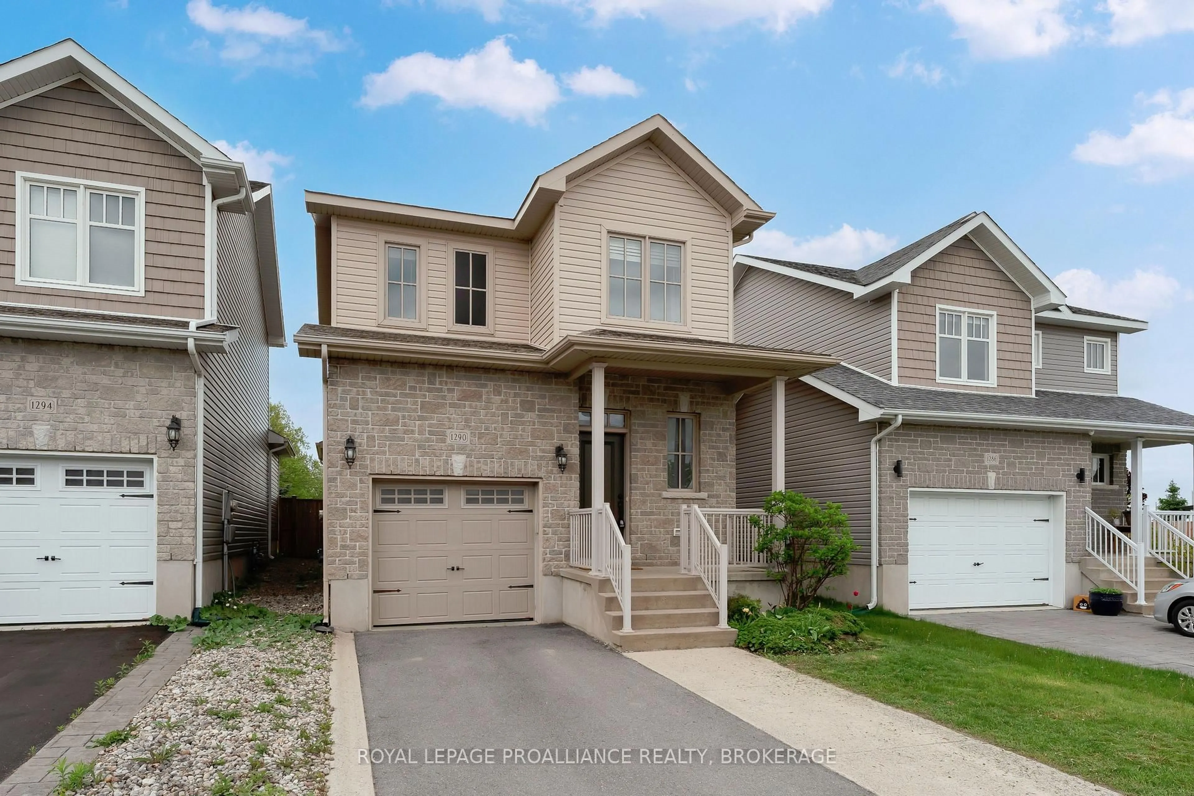 Home with vinyl exterior material, street for 1290 Atkinson St, Kingston Ontario K7P 0J7
